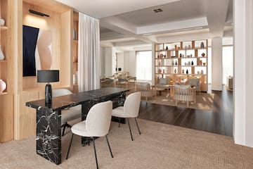 a room with a table and chairs
