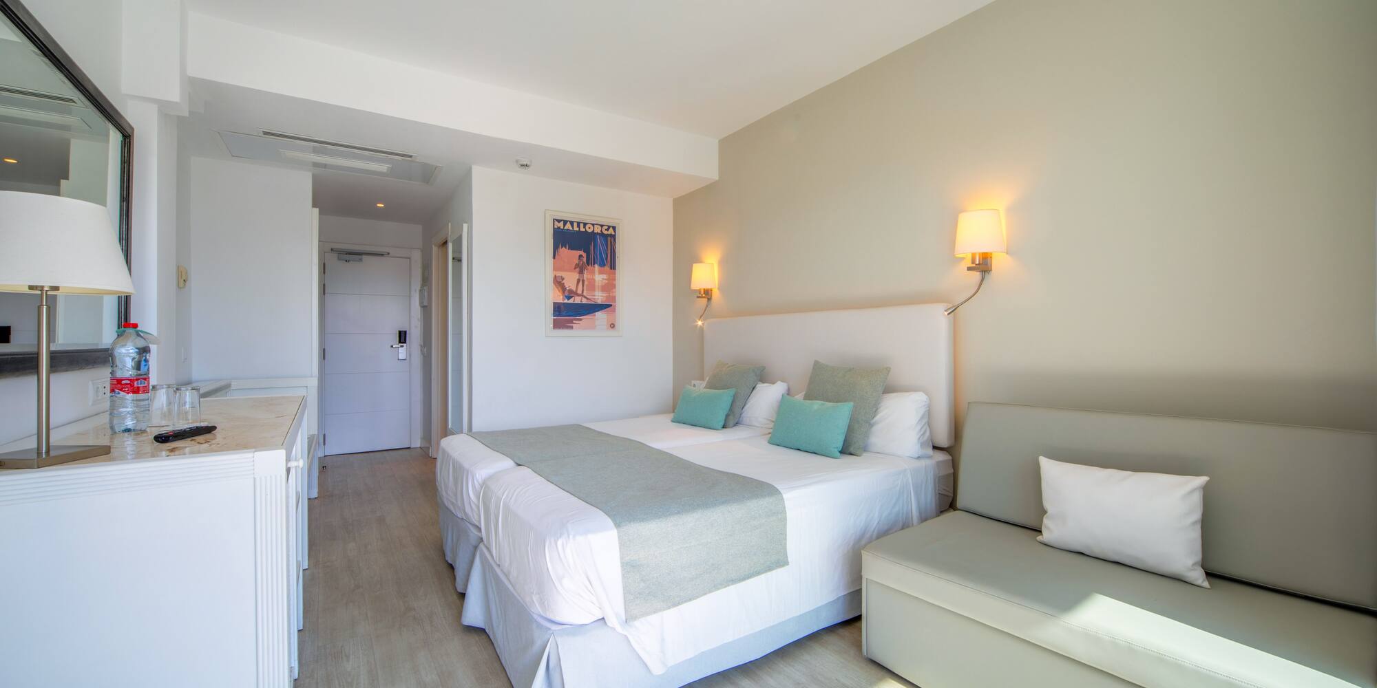 a room with a bed and a couch