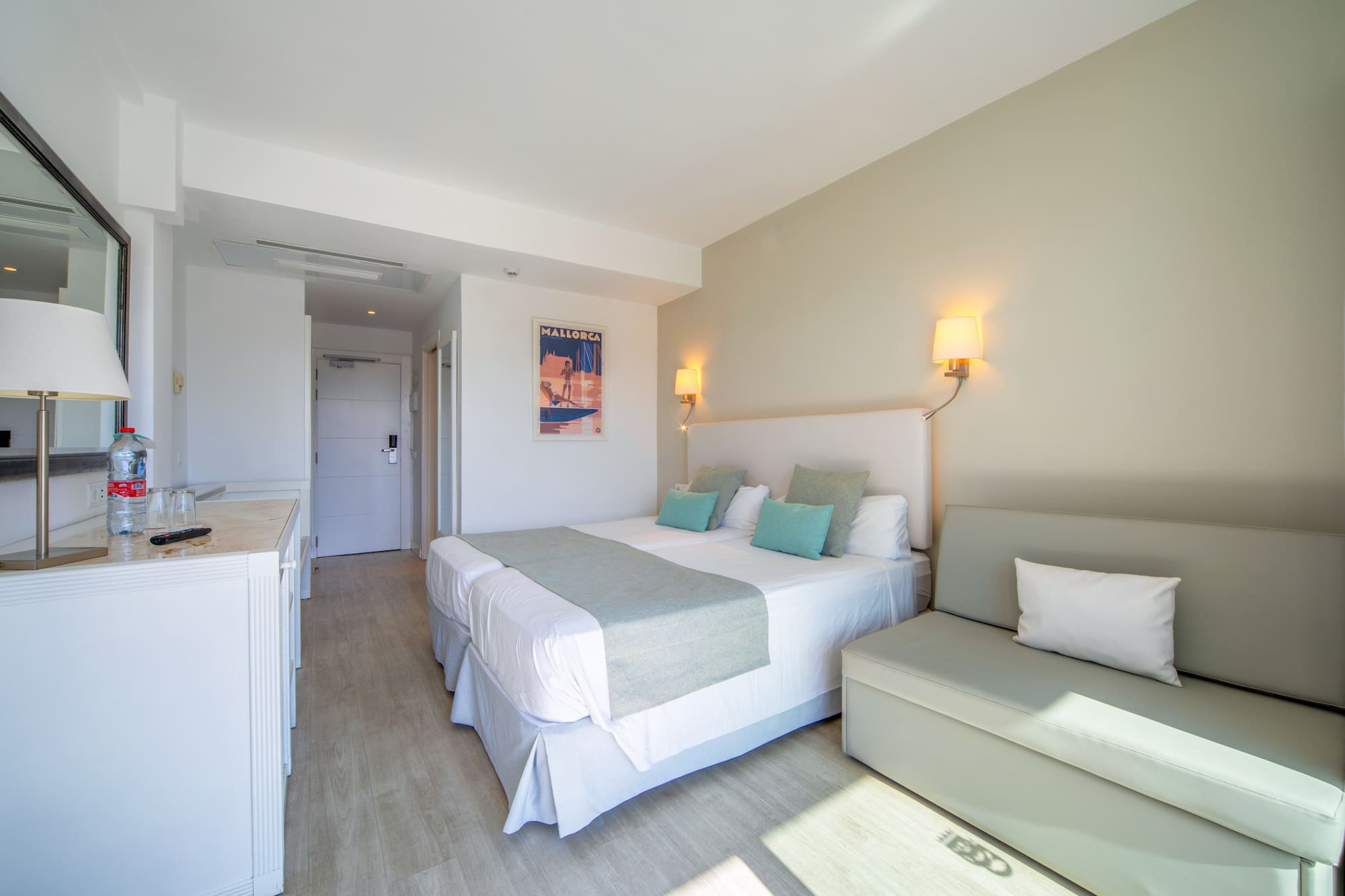 a room with a bed and a couch