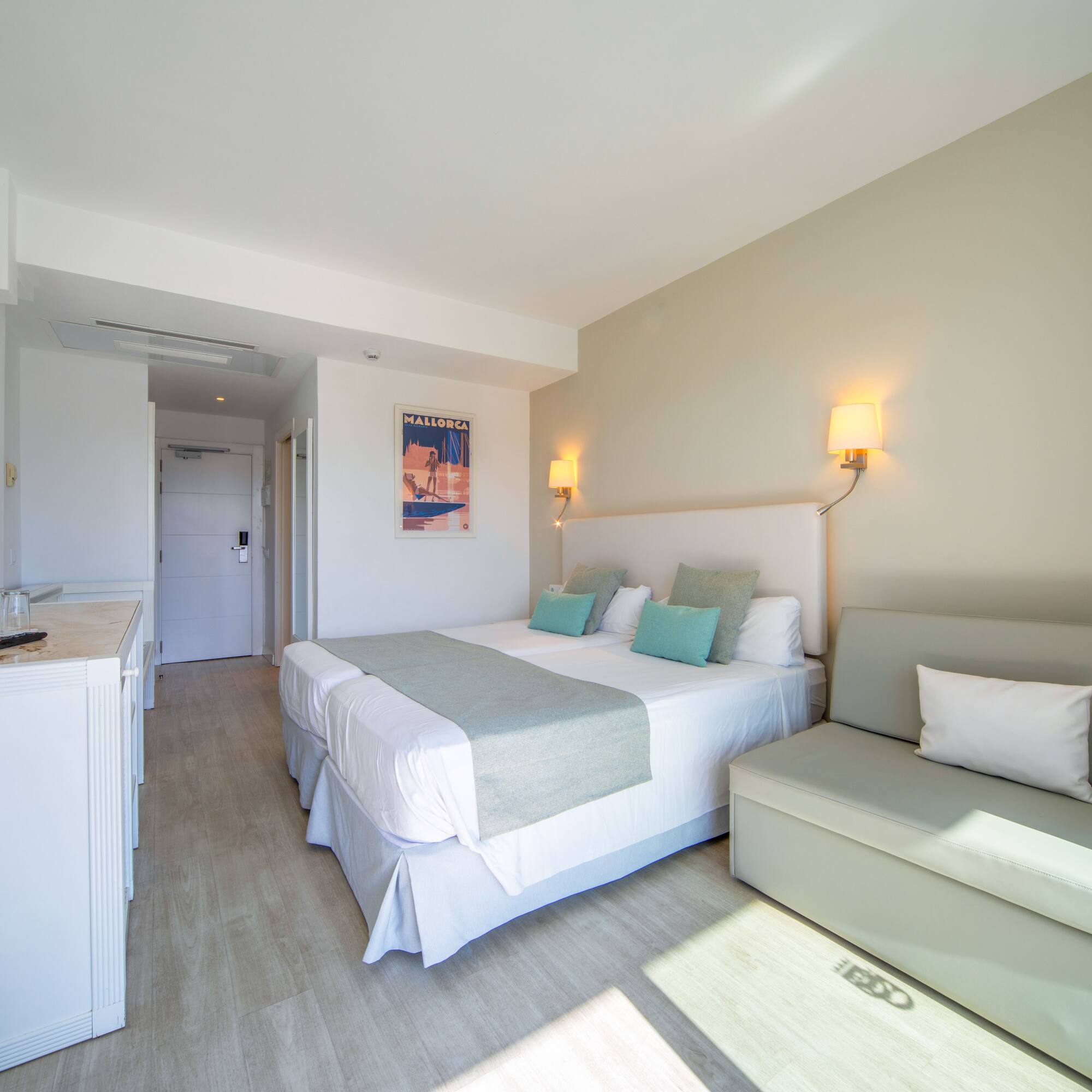 a room with a bed and a couch