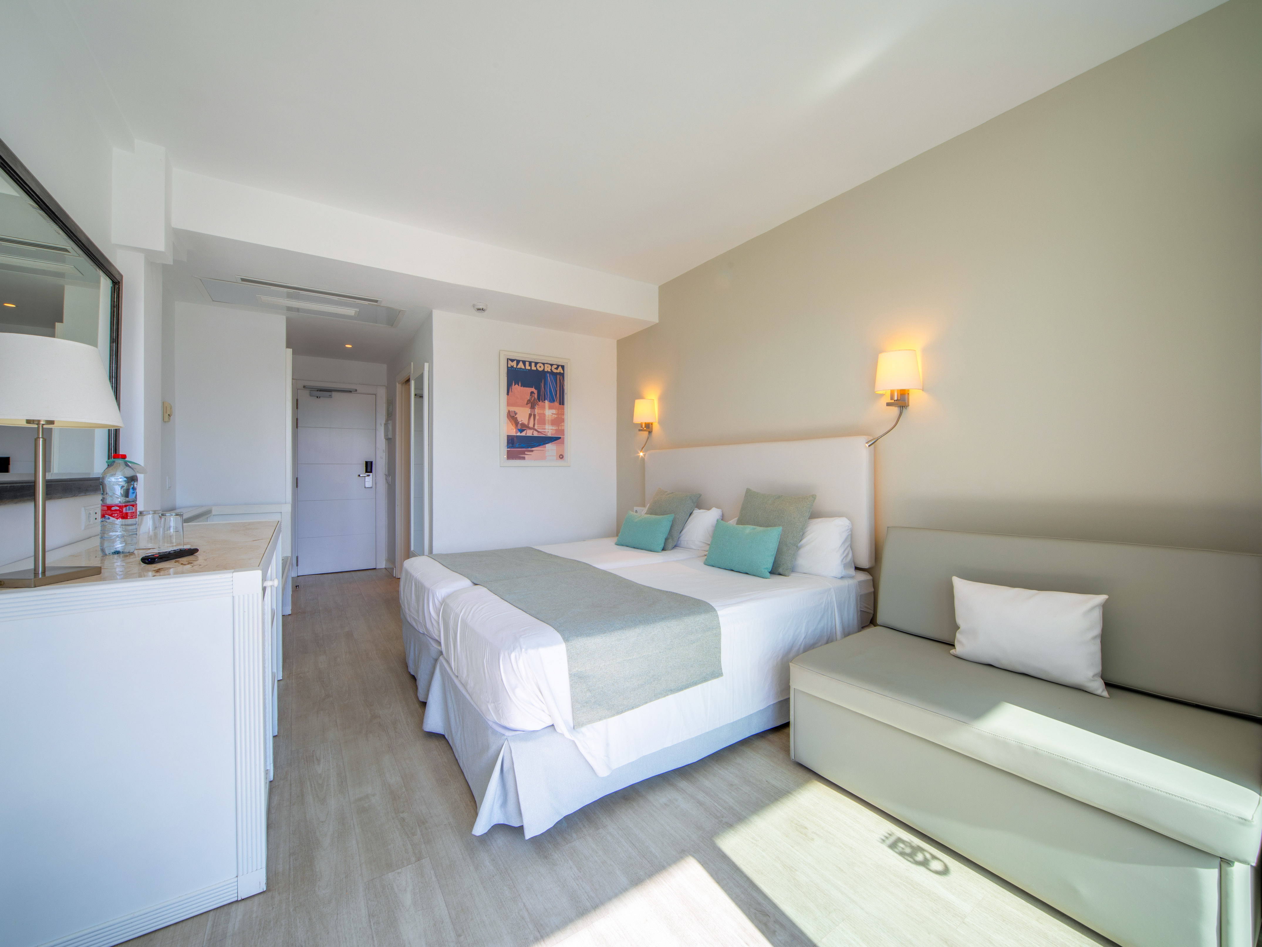 a room with a bed and a couch