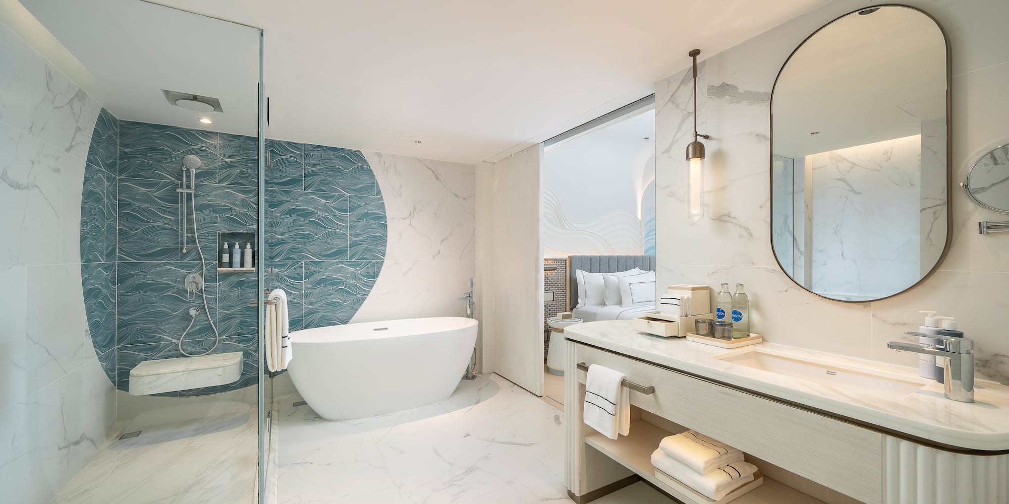 a bathroom with a tub and a shower