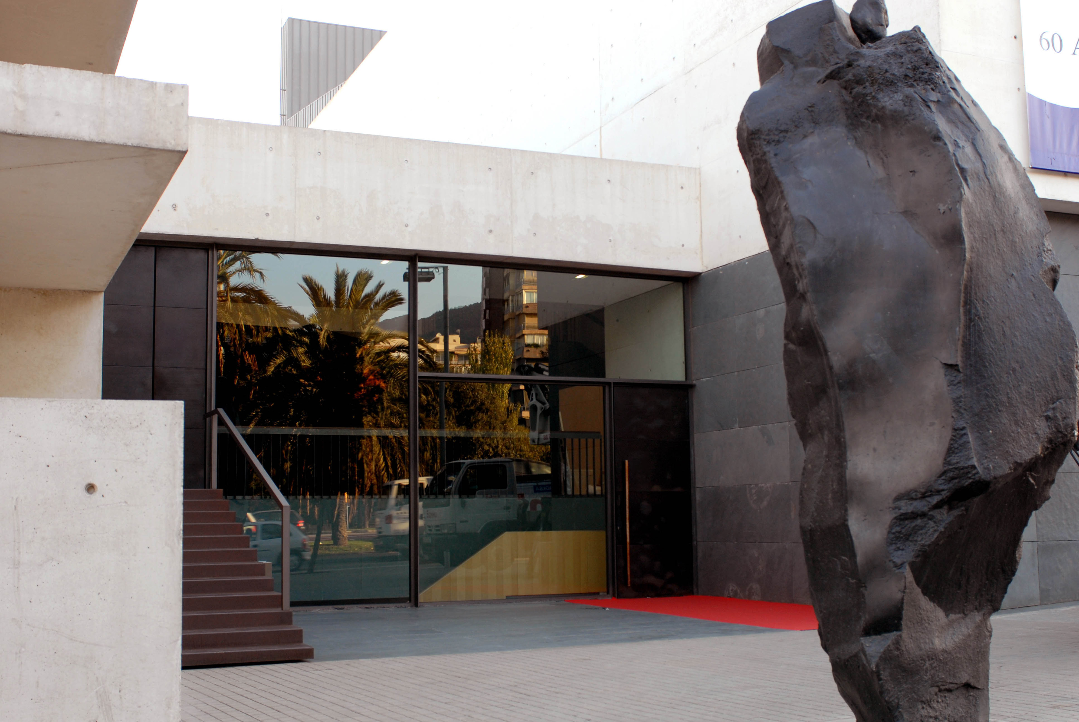 a building with a large statue in front of it