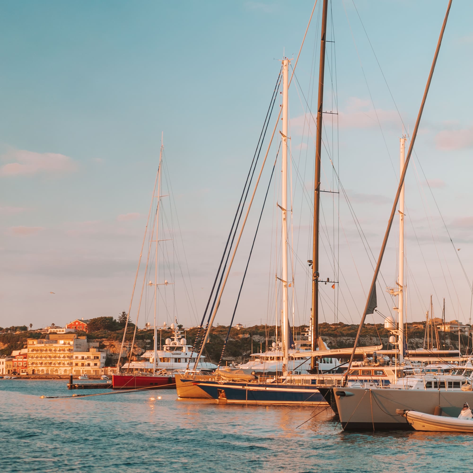 a group of boats in a harbor