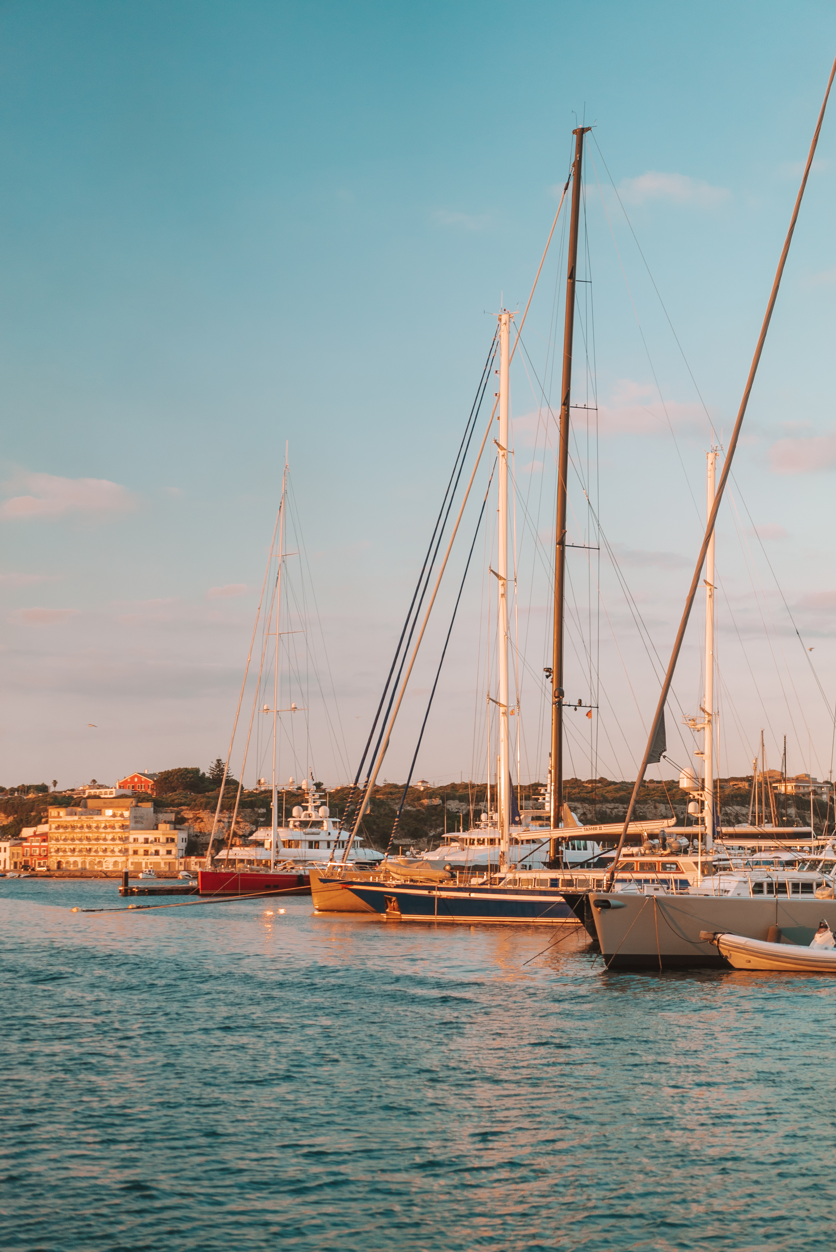 a group of boats in a harbor