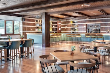 a room with tables and chairs