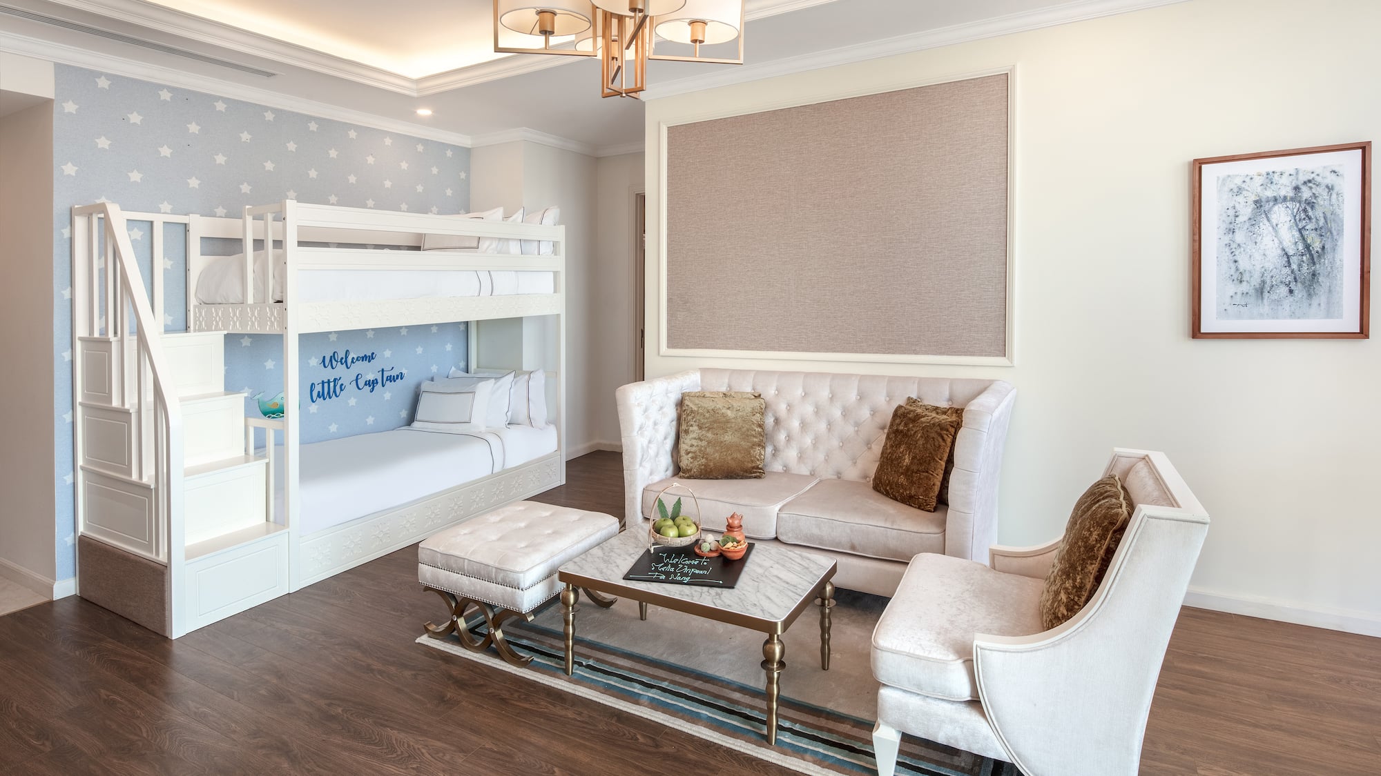 a room with a bunk bed and couch