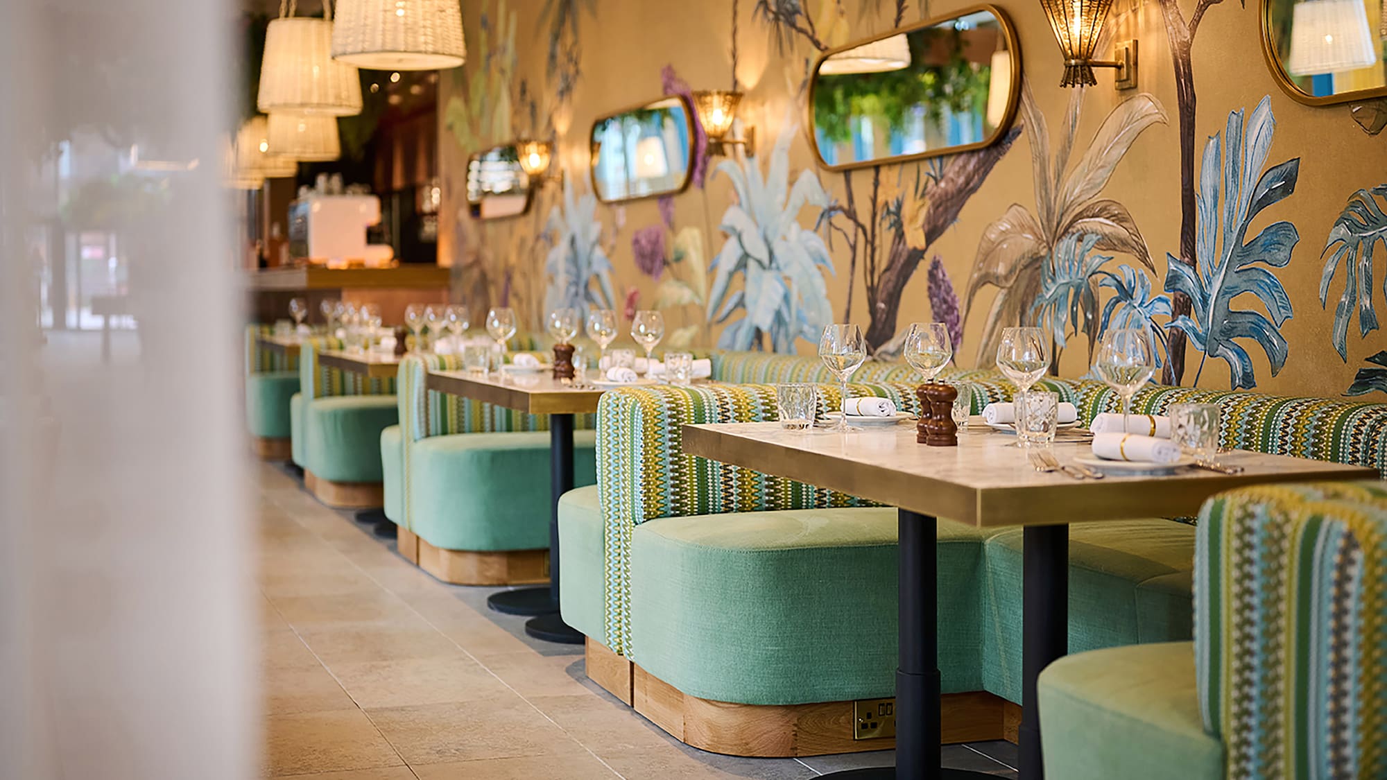 a restaurant with tables and chairs