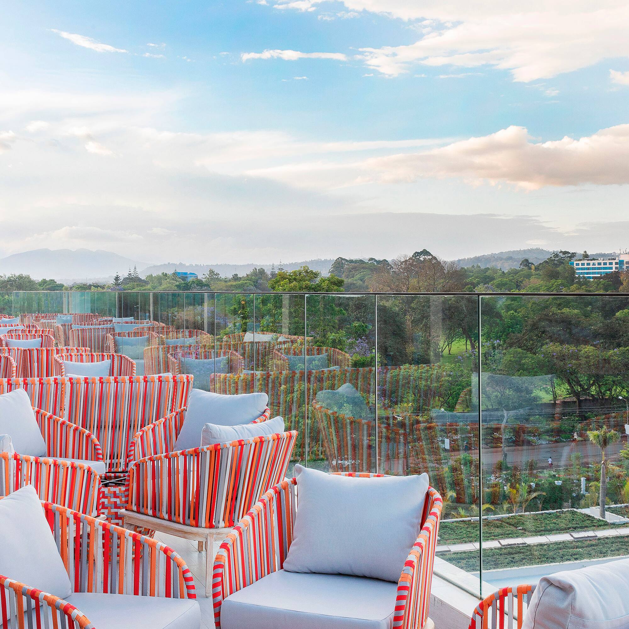 a group of chairs on a rooftop