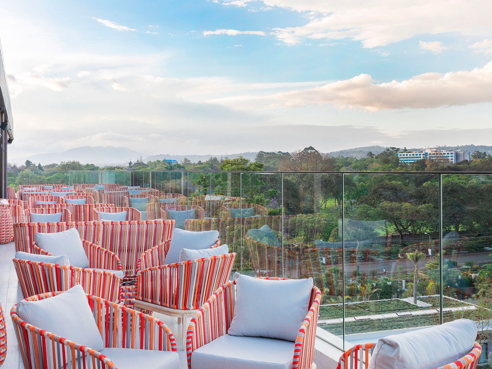 a group of chairs on a rooftop