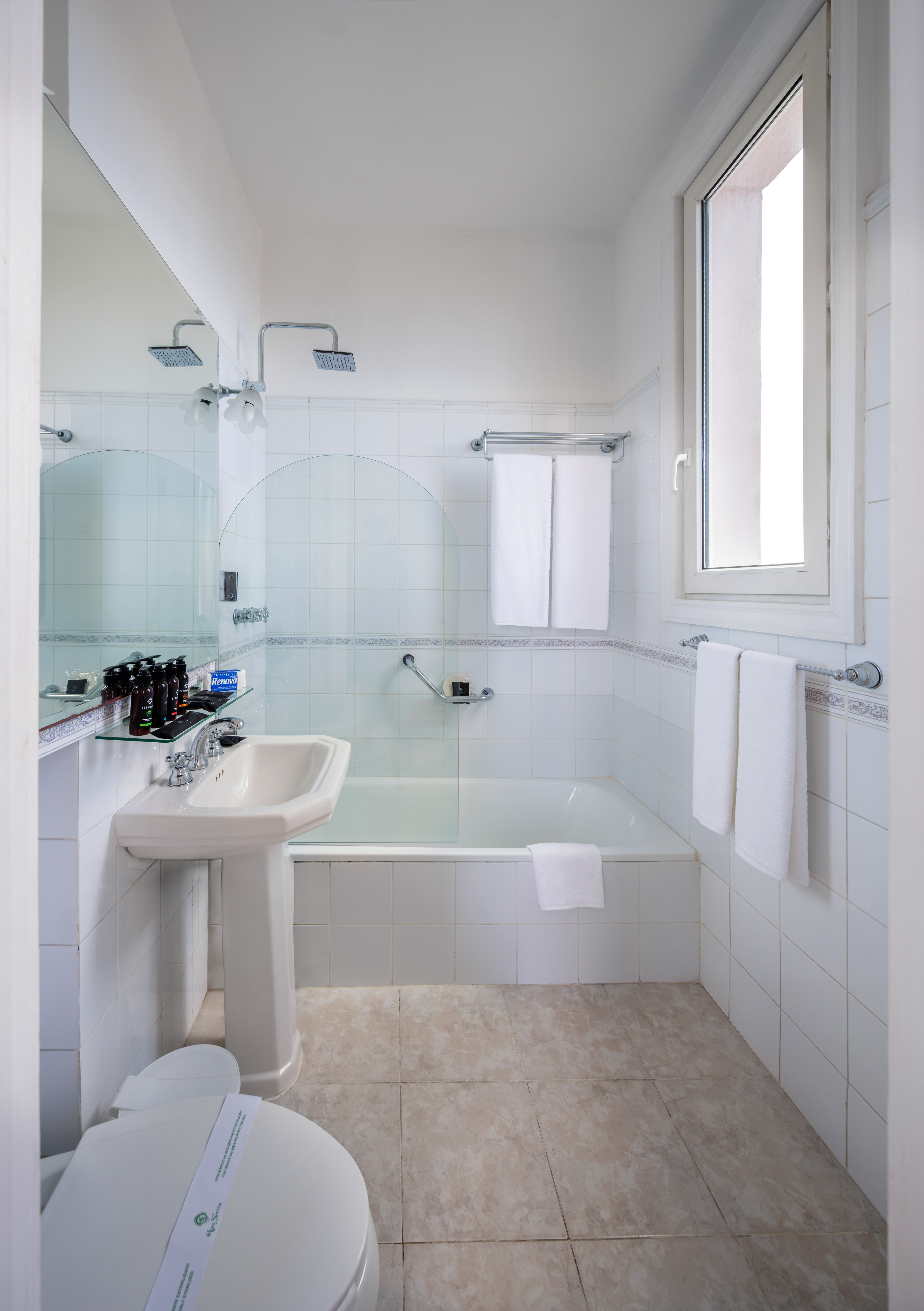a bathroom with a sink and shower