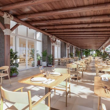 a restaurant with tables and chairs