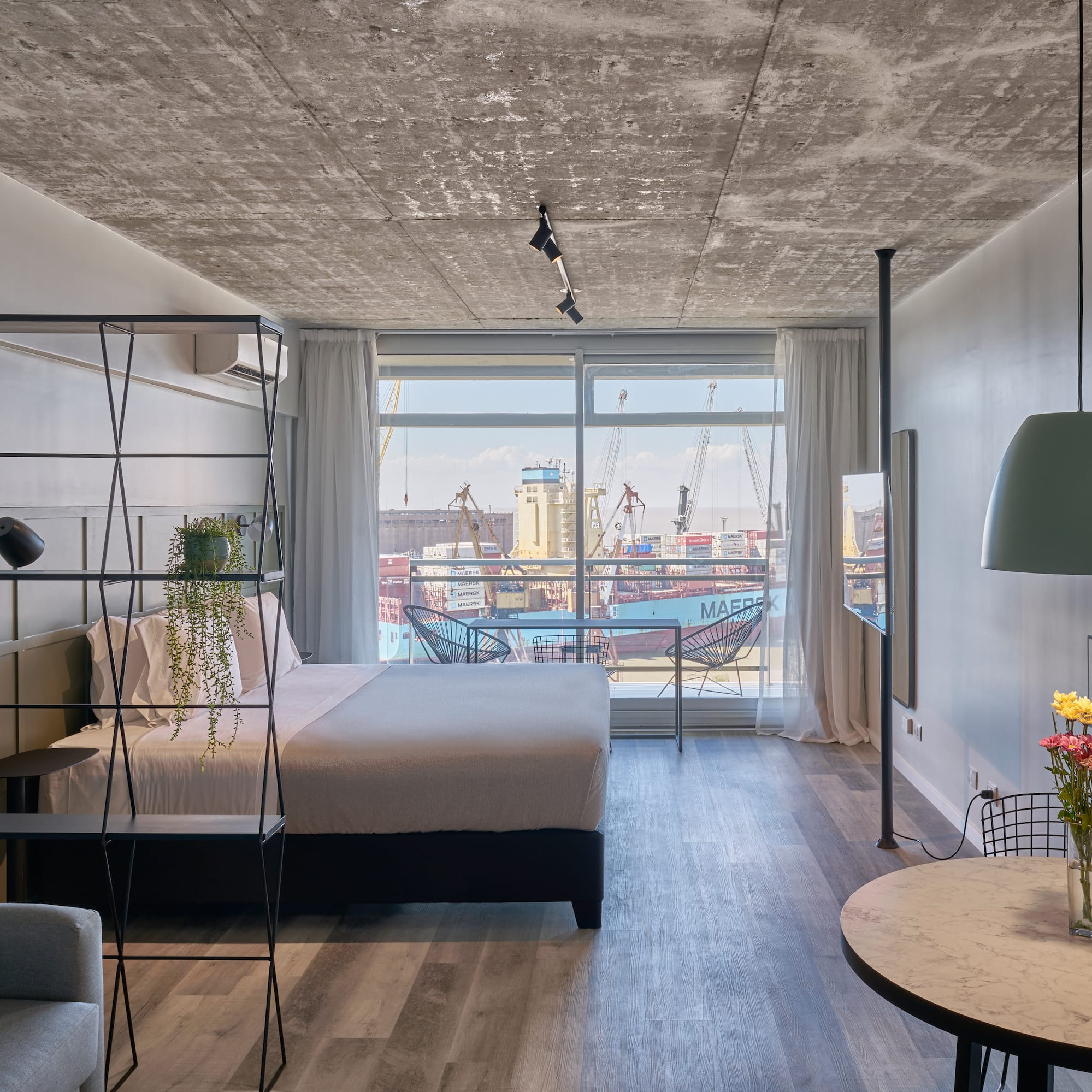 a room with a bed and a table