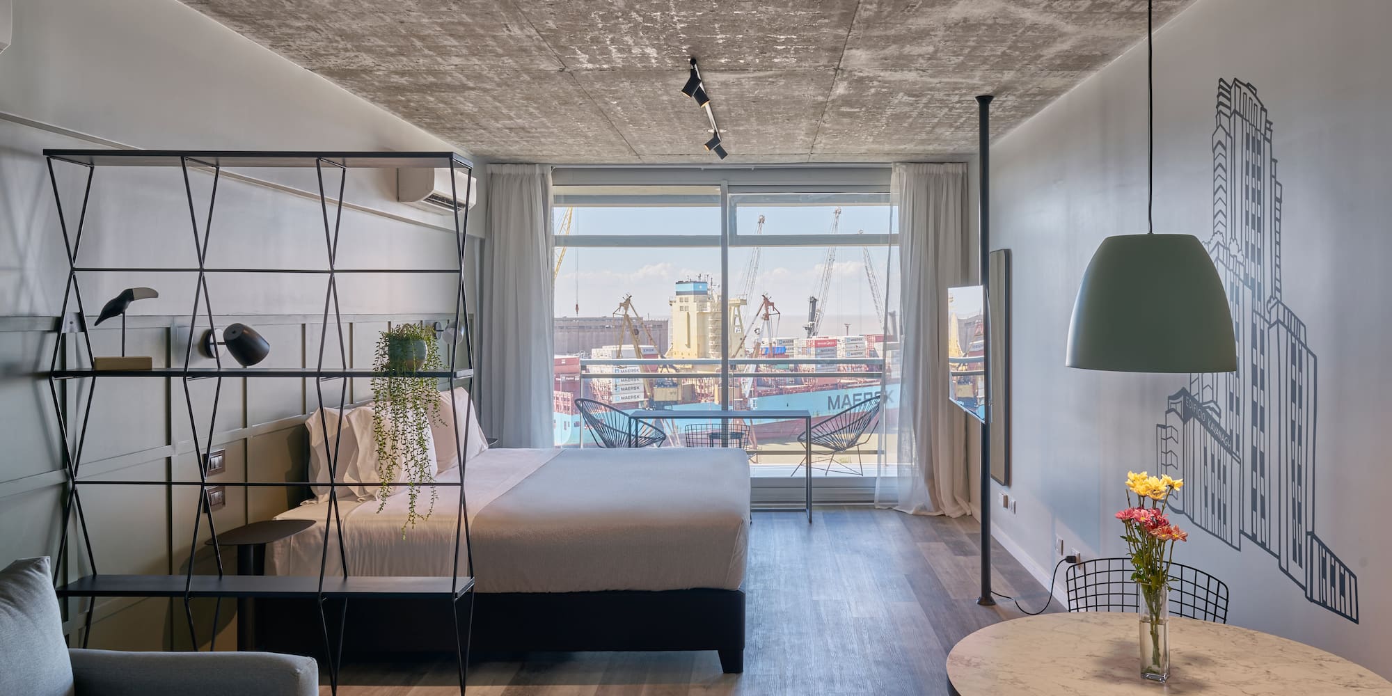 a room with a bed and a table