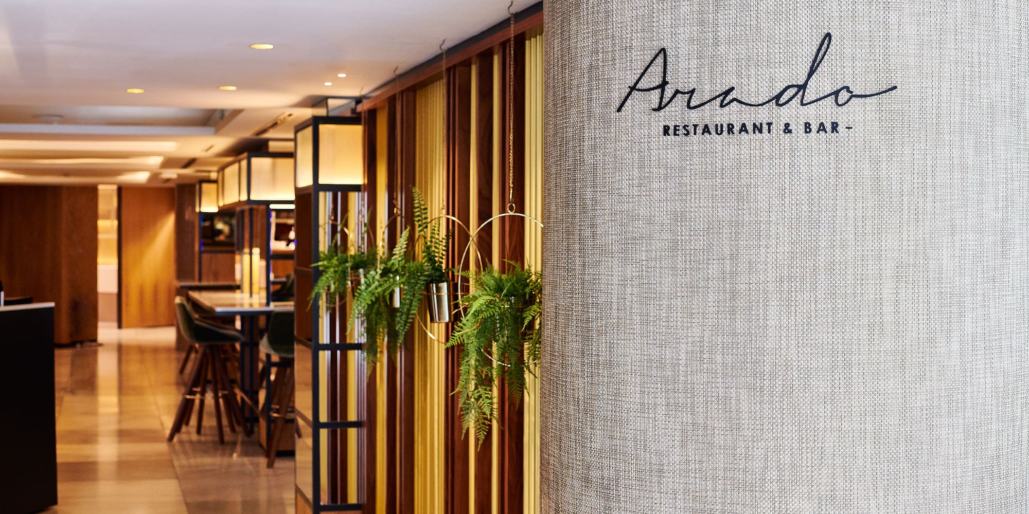 a wall with plants in it