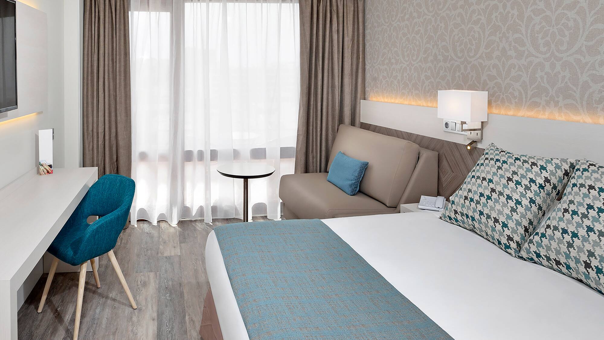 a room with a bed and a chair