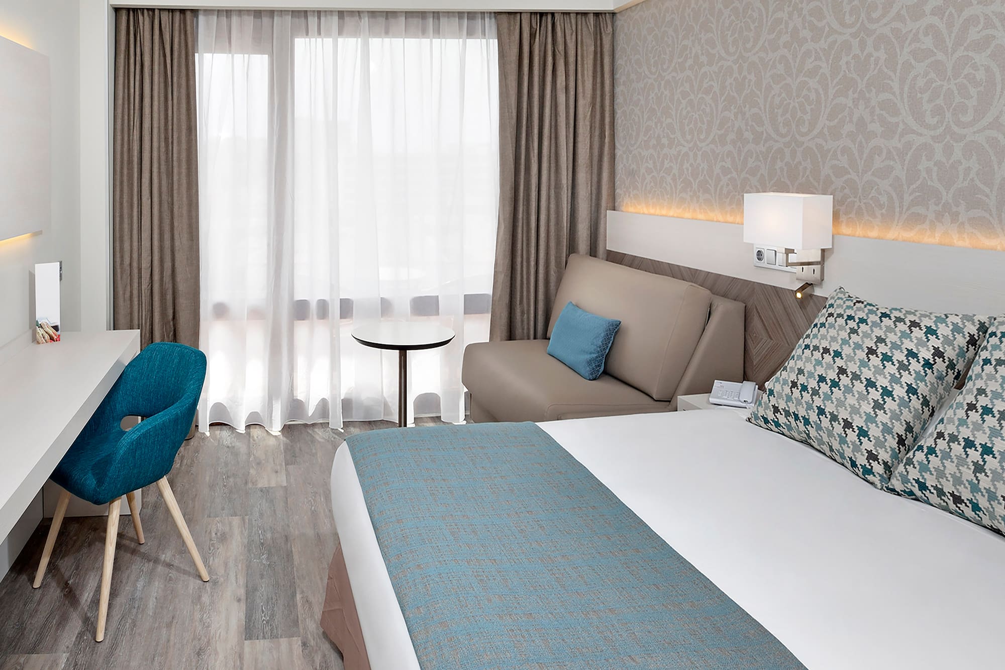 a room with a bed and a chair