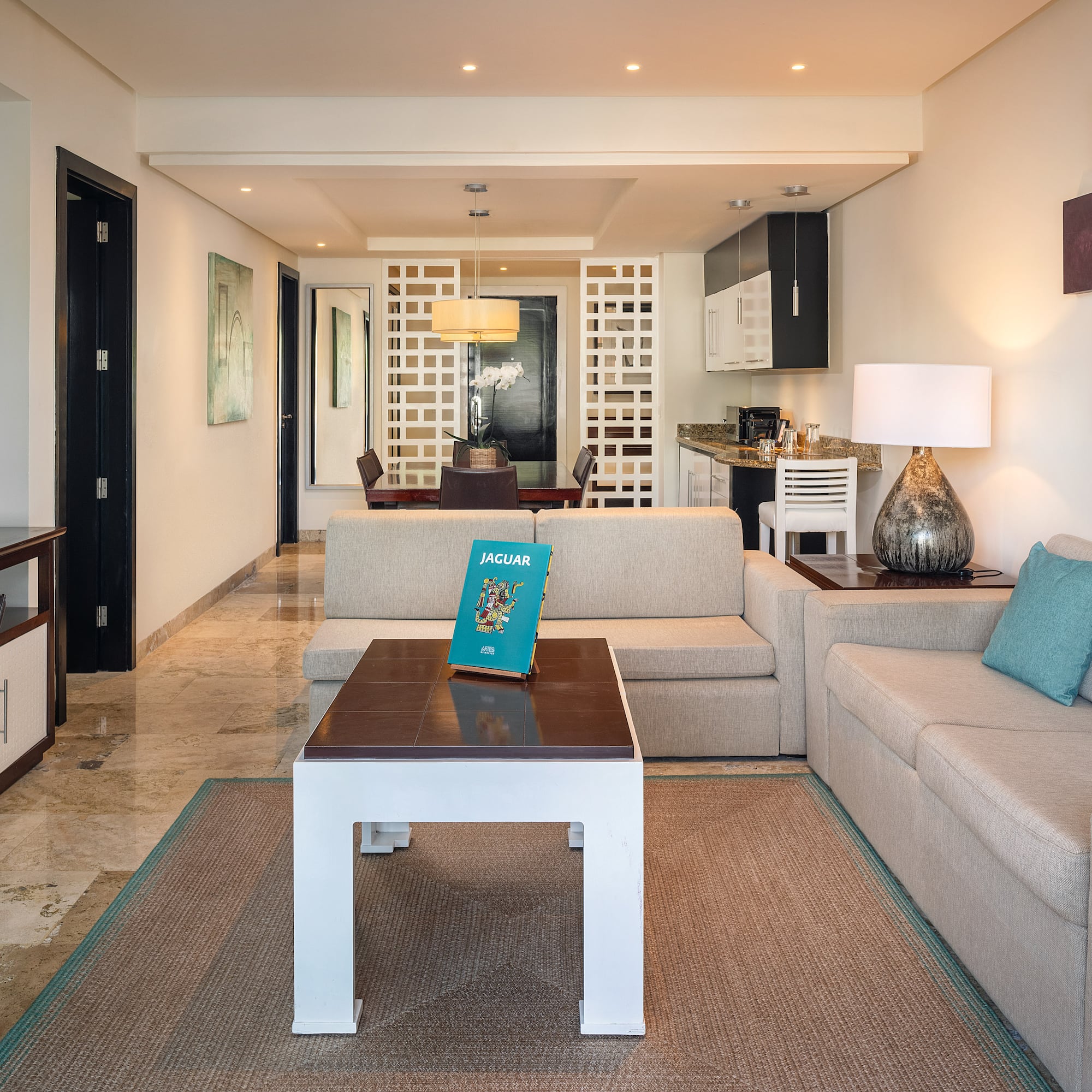 a living room with a couch and a table