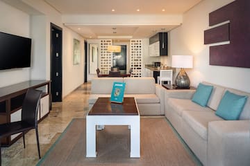 a living room with a couch and a table
