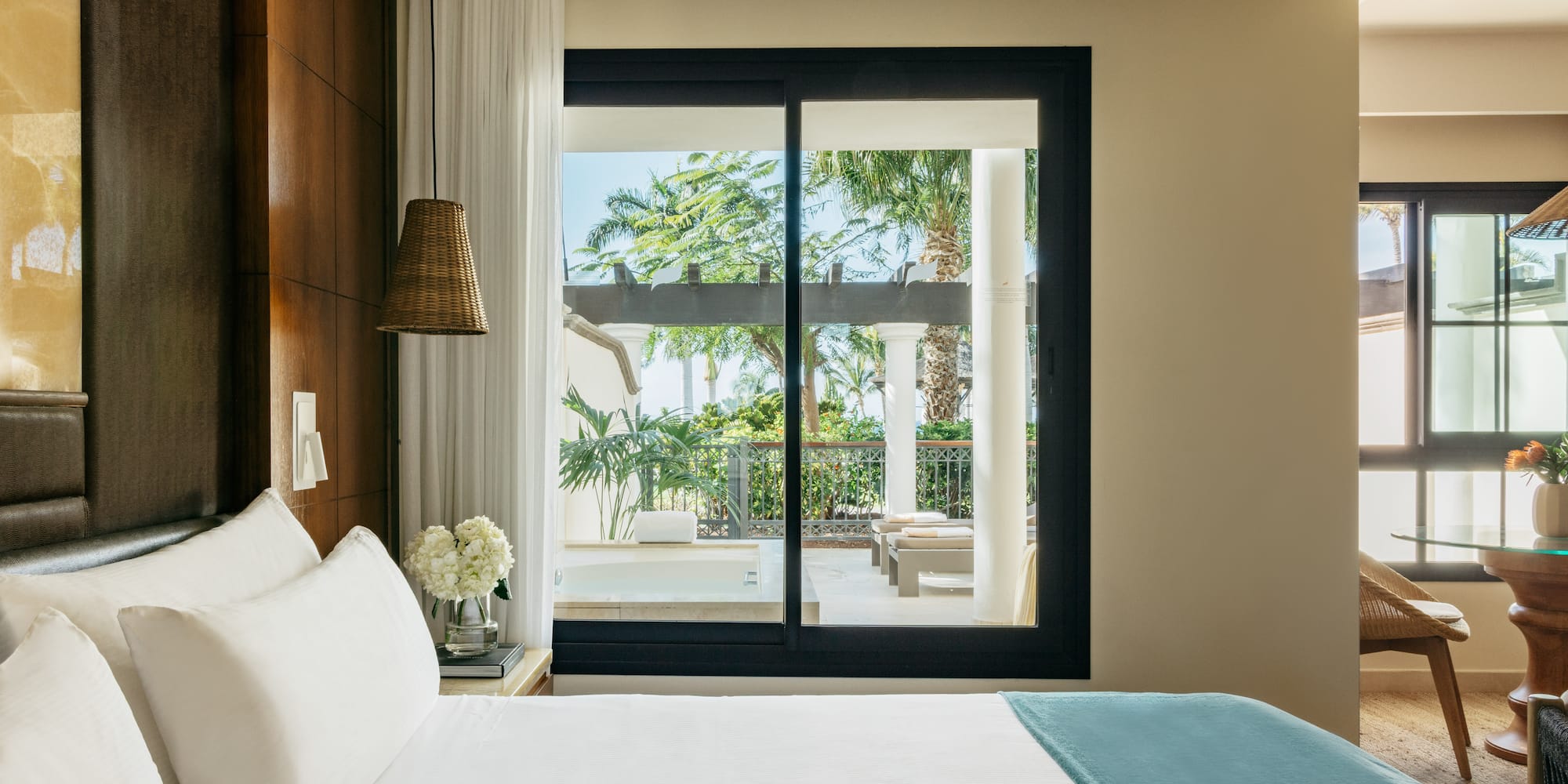 a bed with a glass door