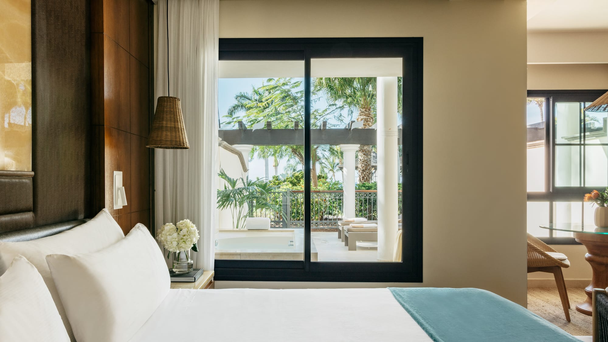 a bed with a glass door