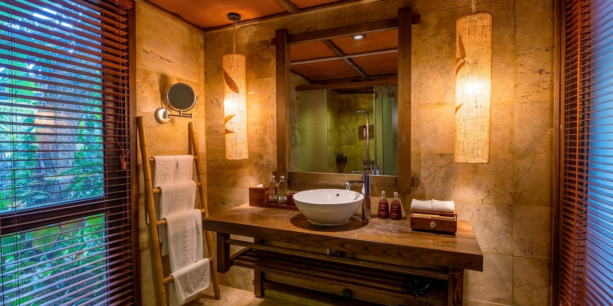 a bathroom with a sink and mirror