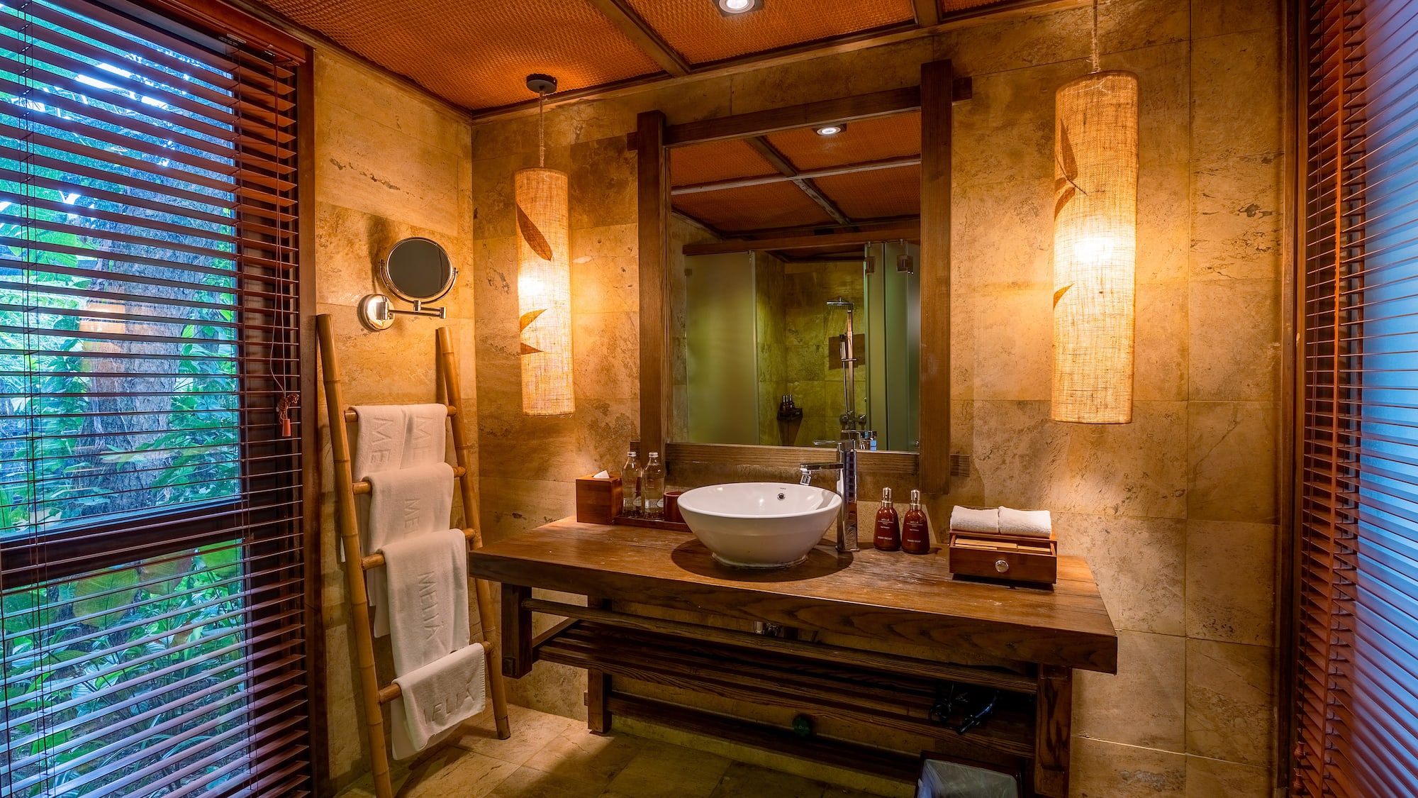 a bathroom with a sink and mirror