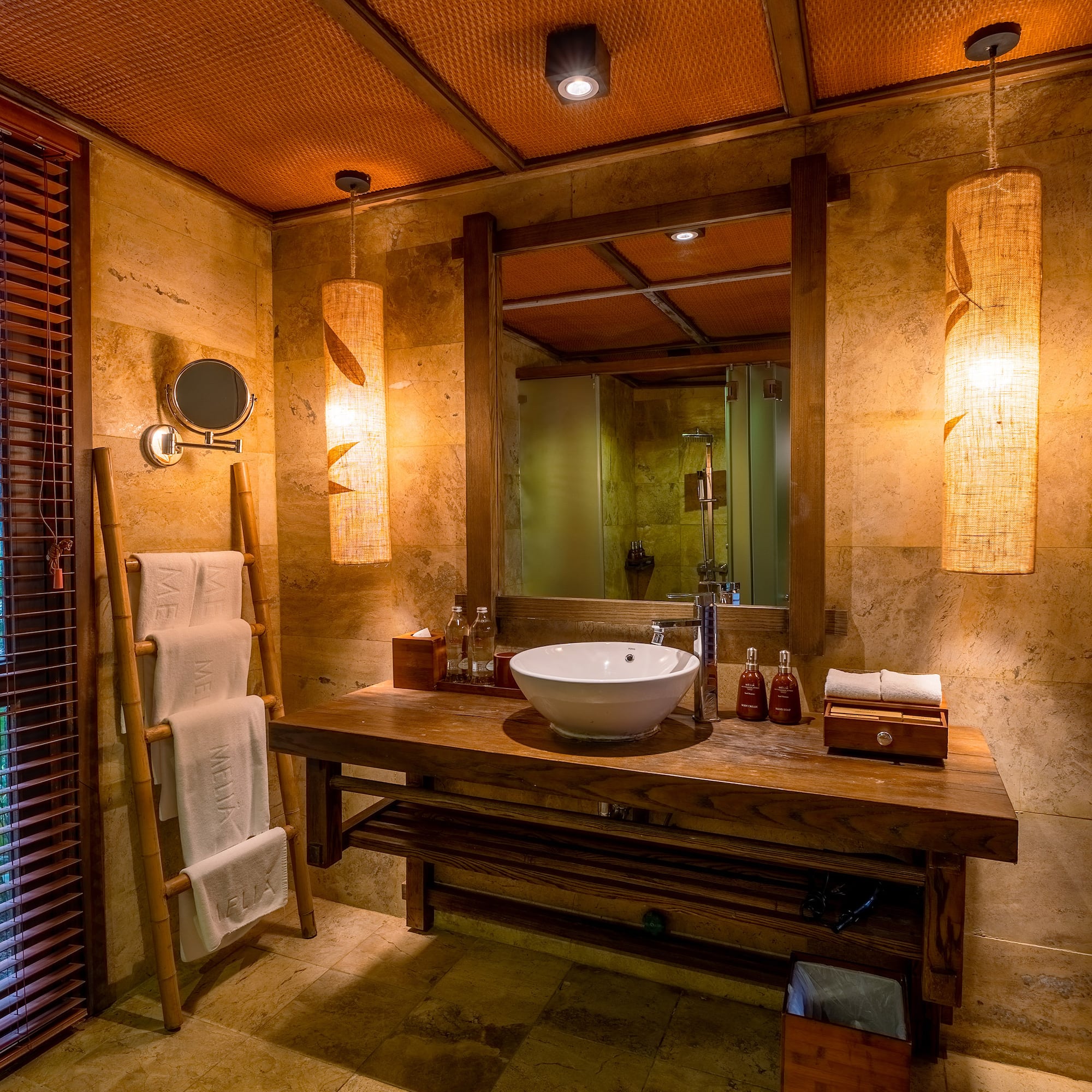 a bathroom with a sink and mirror