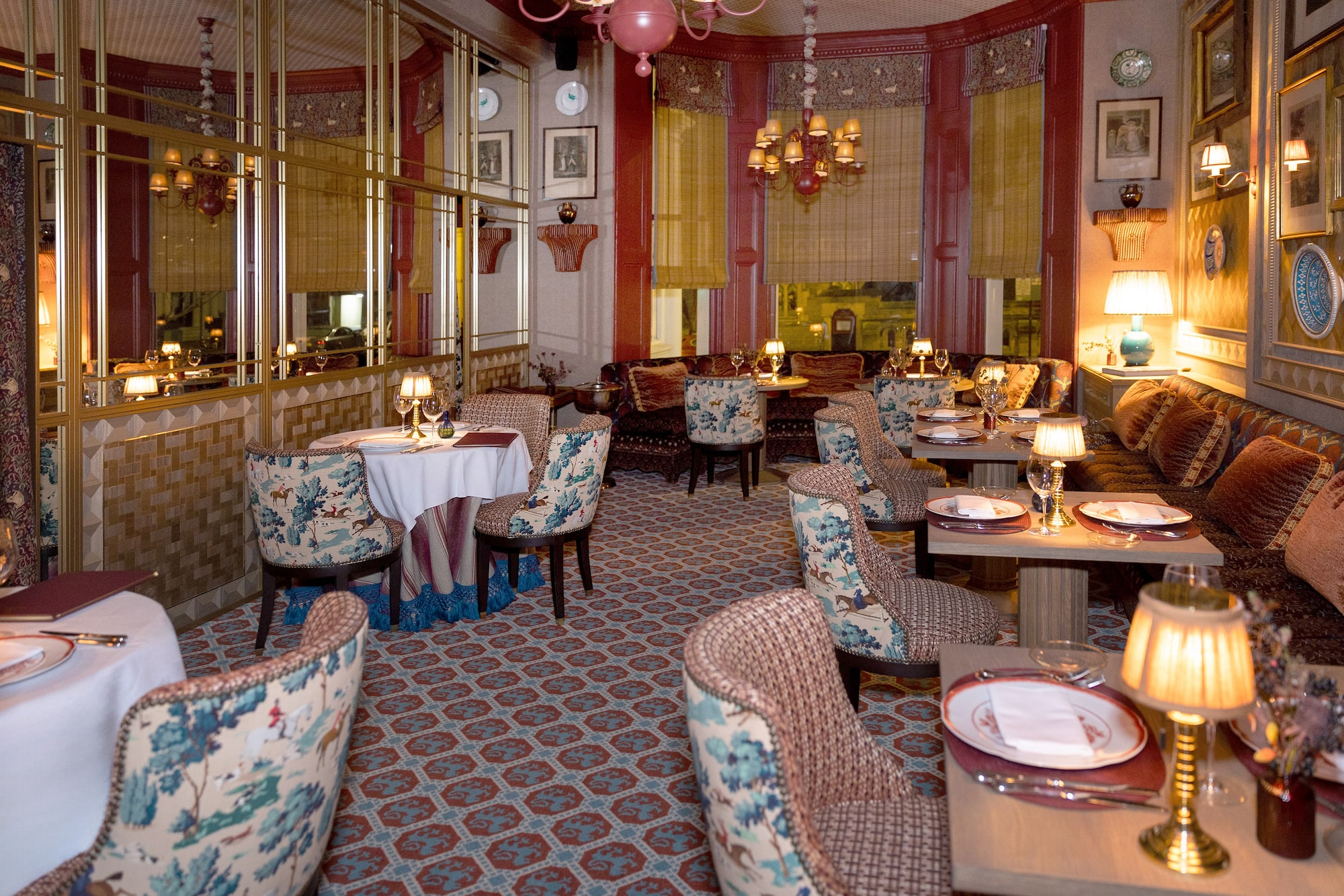 a restaurant with tables and chairs