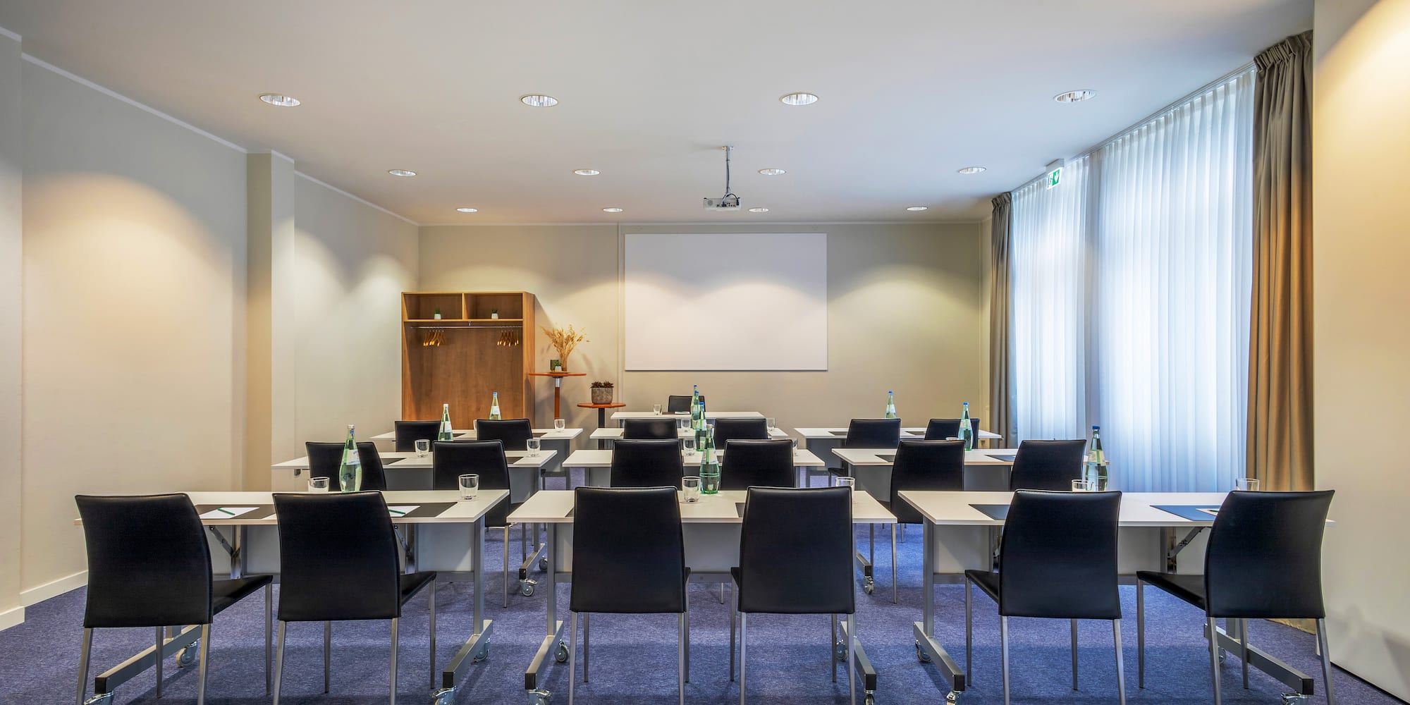 a room with tables and chairs