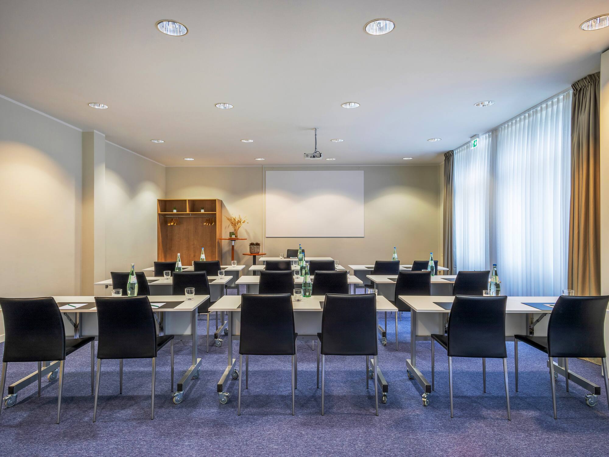 a room with tables and chairs