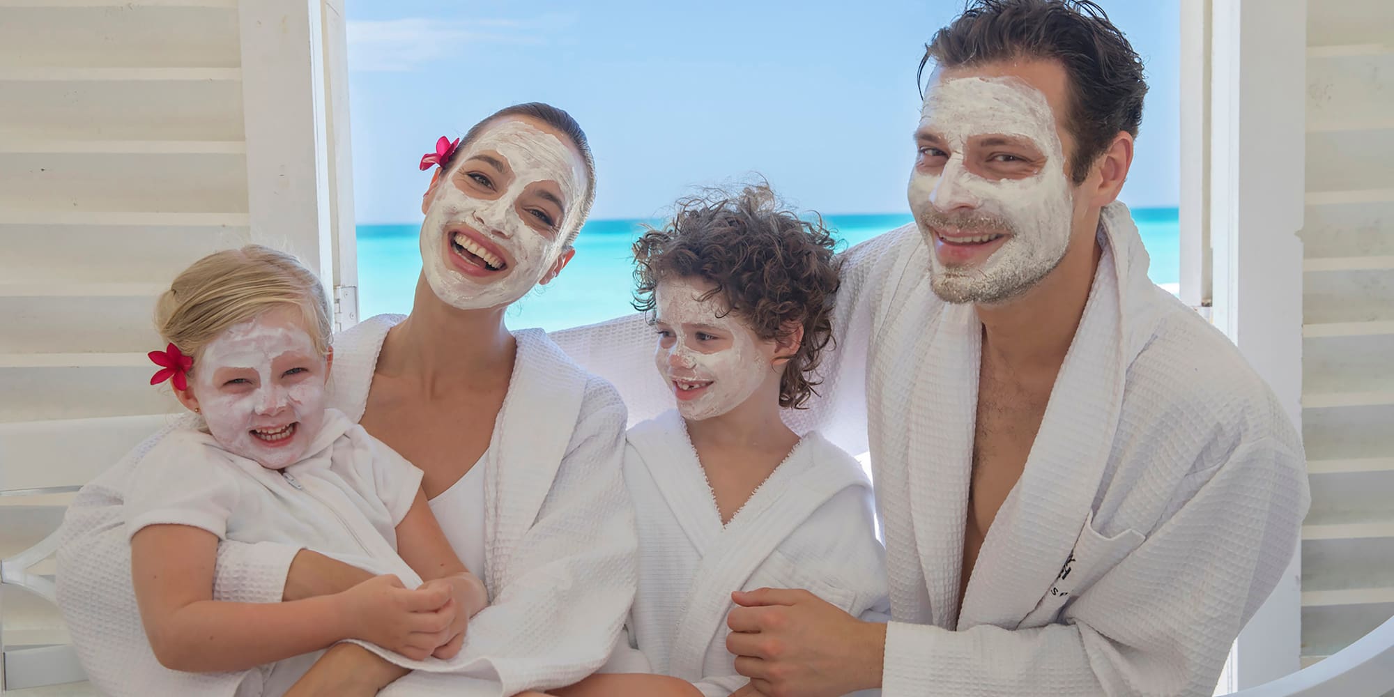 a group of people with white facial masks