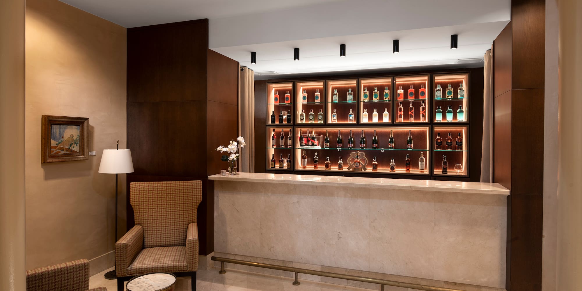 a bar with shelves of liquor bottles