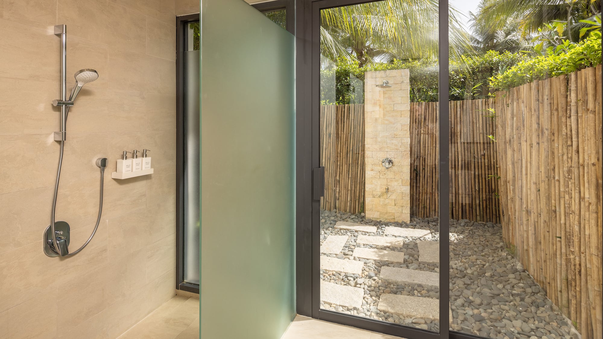 a glass shower door in a bathroom