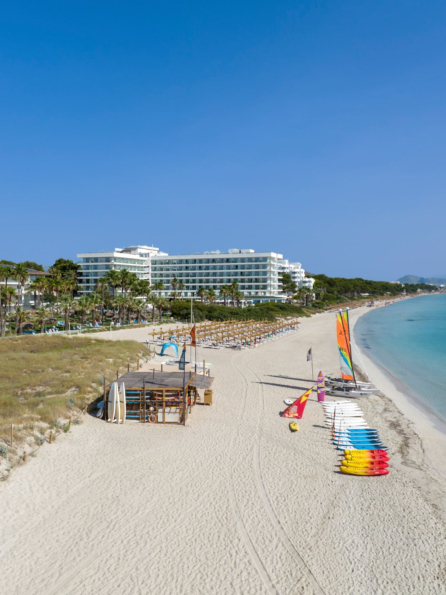 a beach with many colorful objects on it