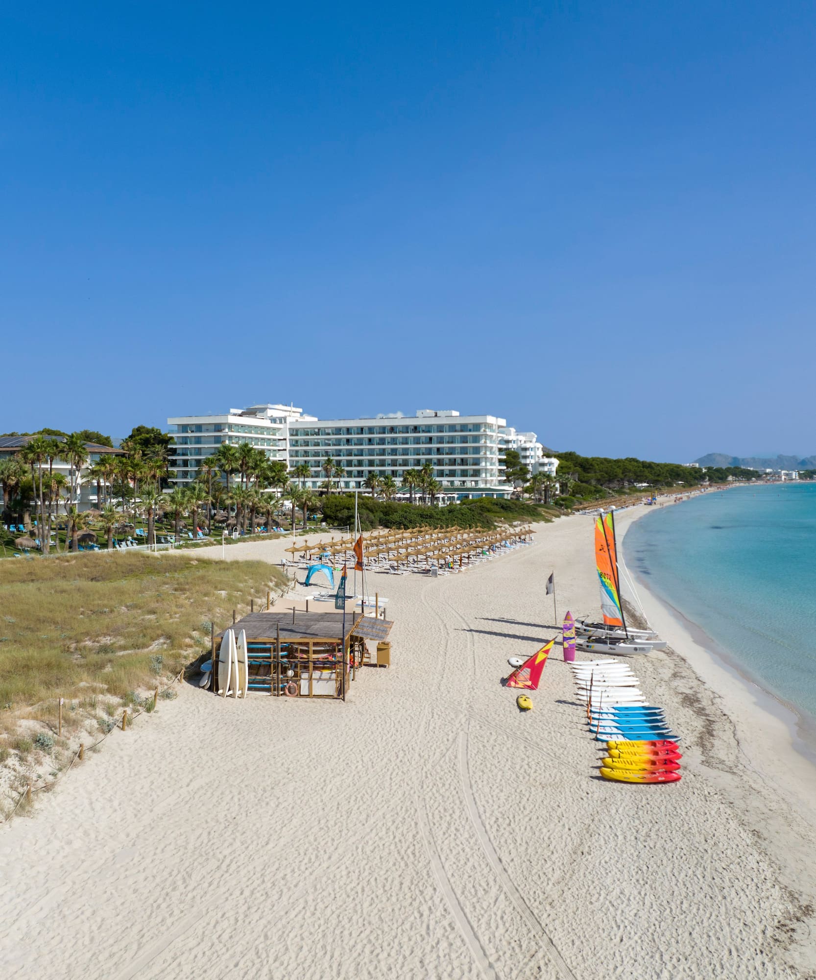 a beach with many colorful objects on it