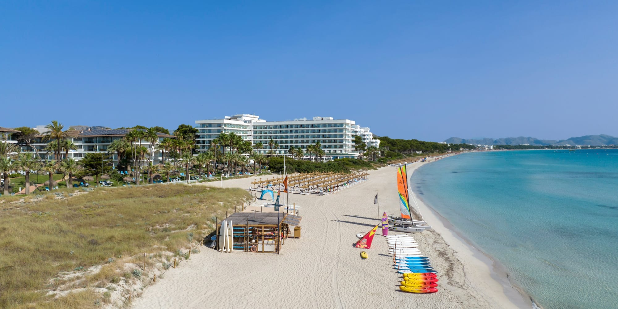 a beach with many colorful objects on it