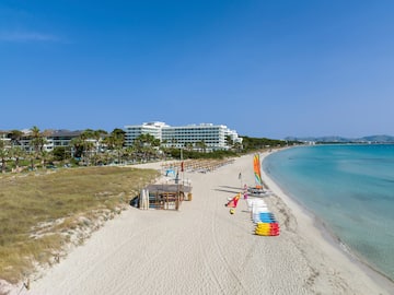 a beach with many colorful objects on it