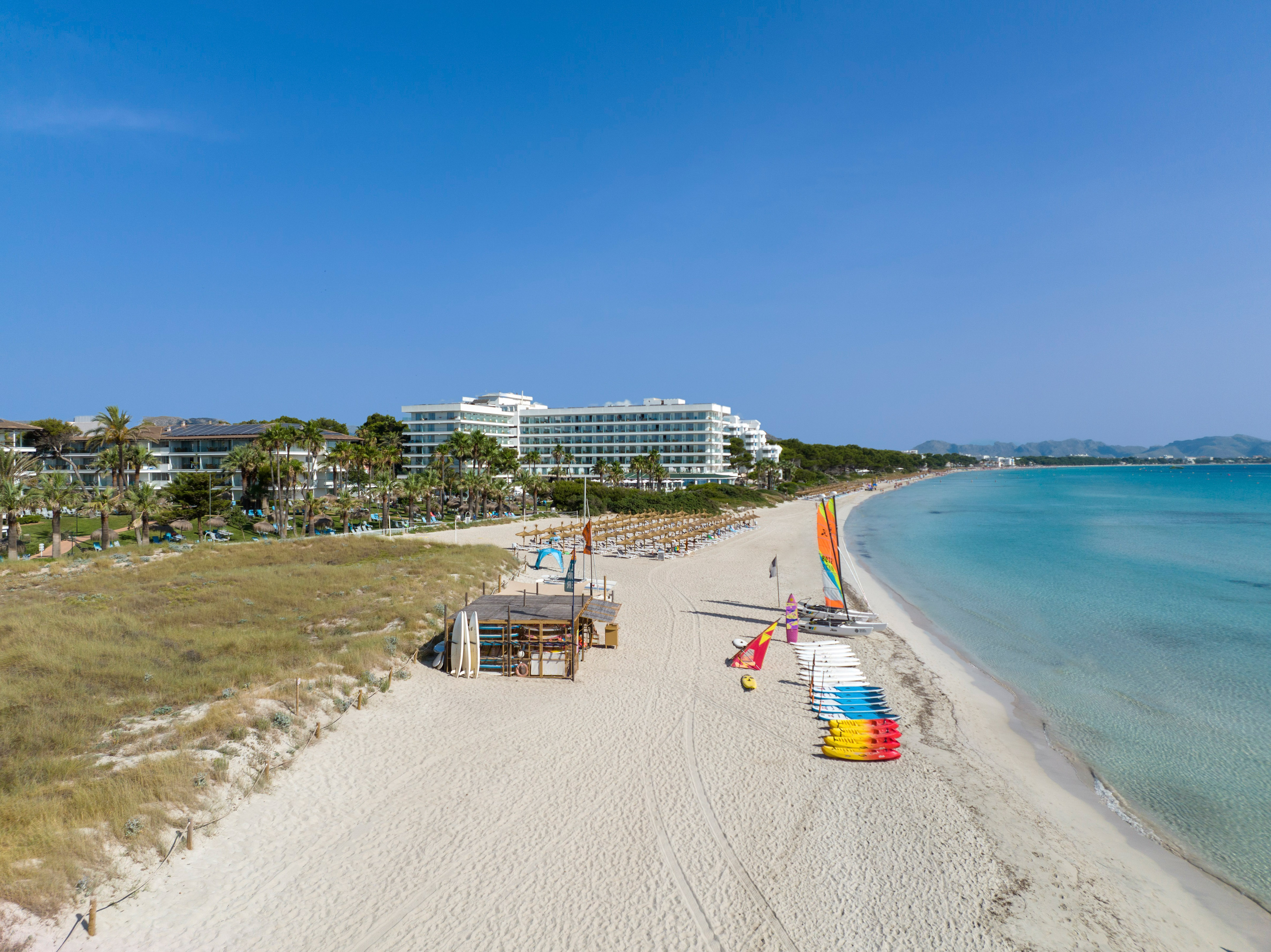 a beach with many colorful objects on it