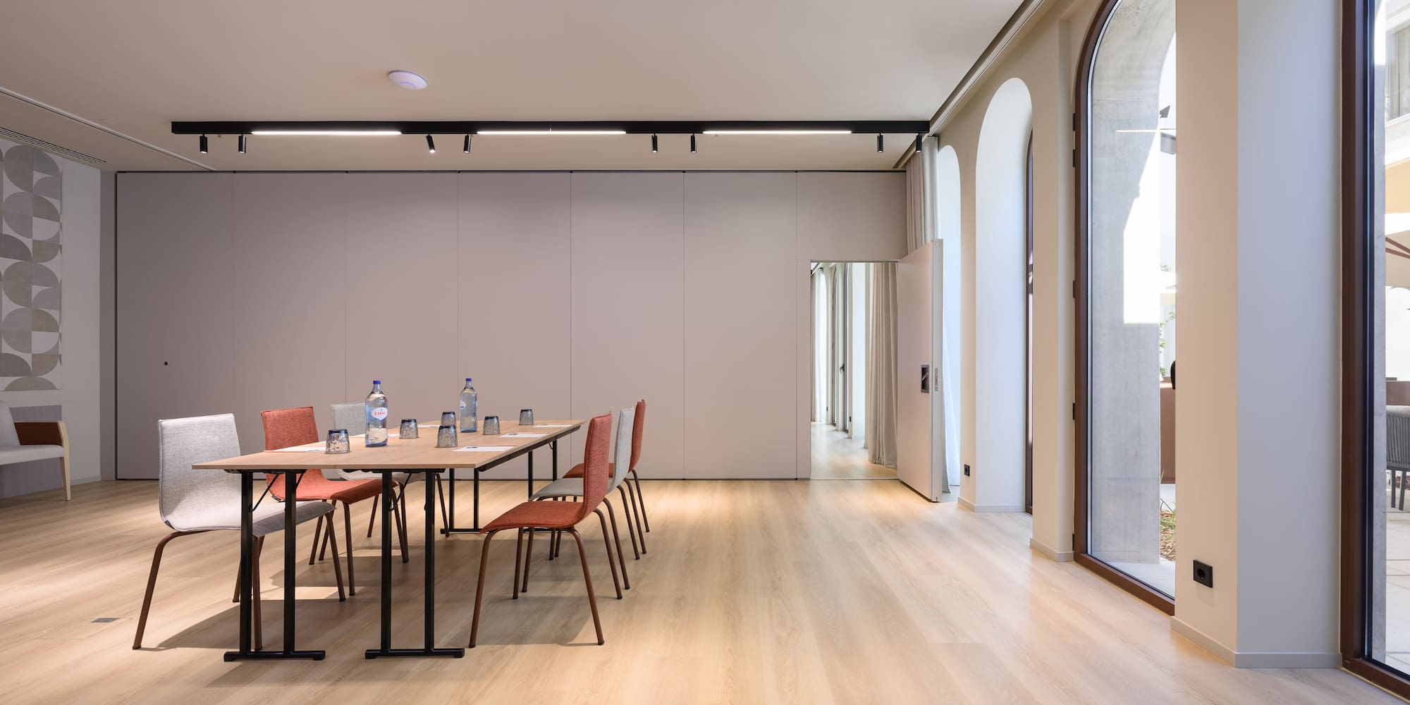 a room with a table and chairs