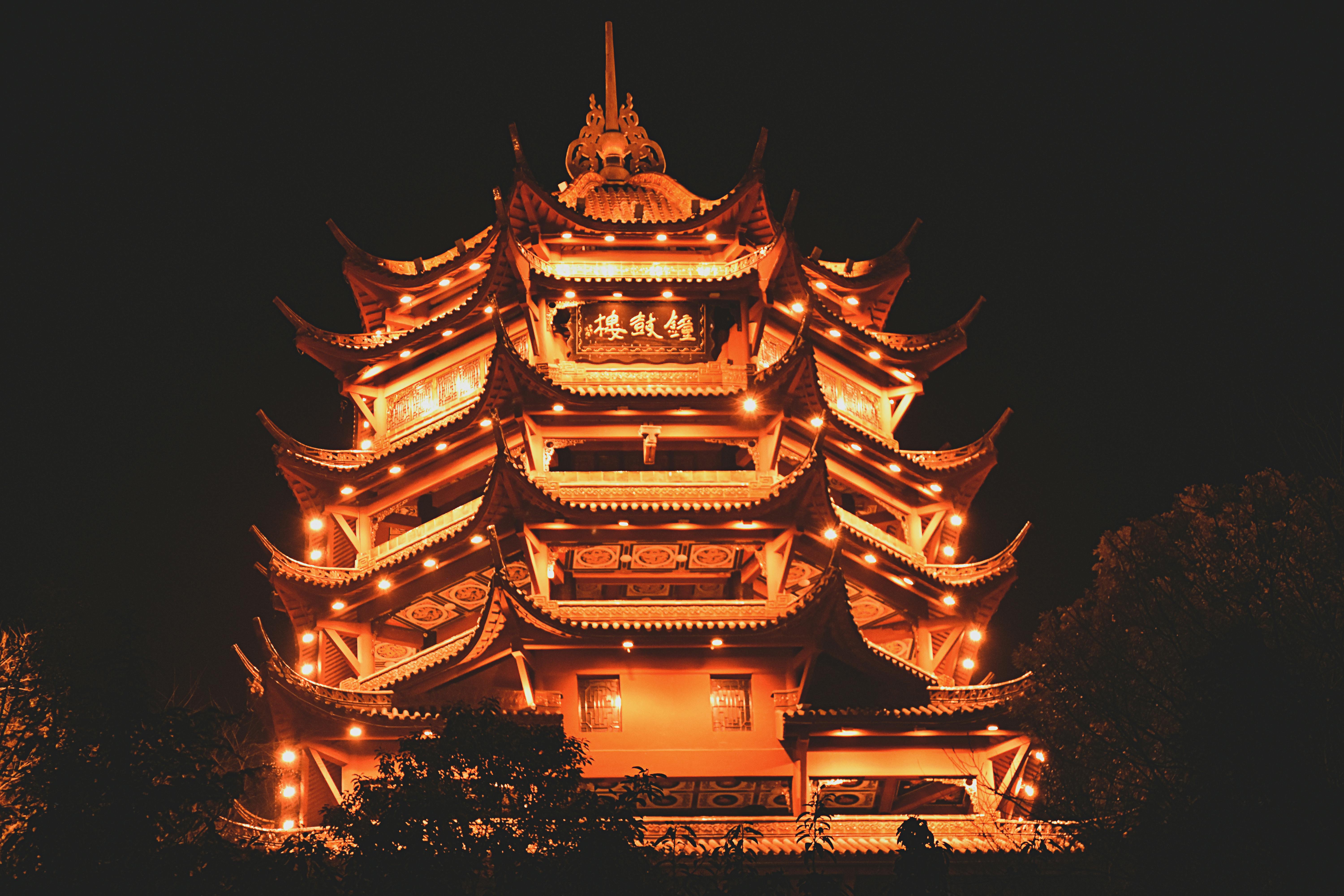 a building with many pagodas at night