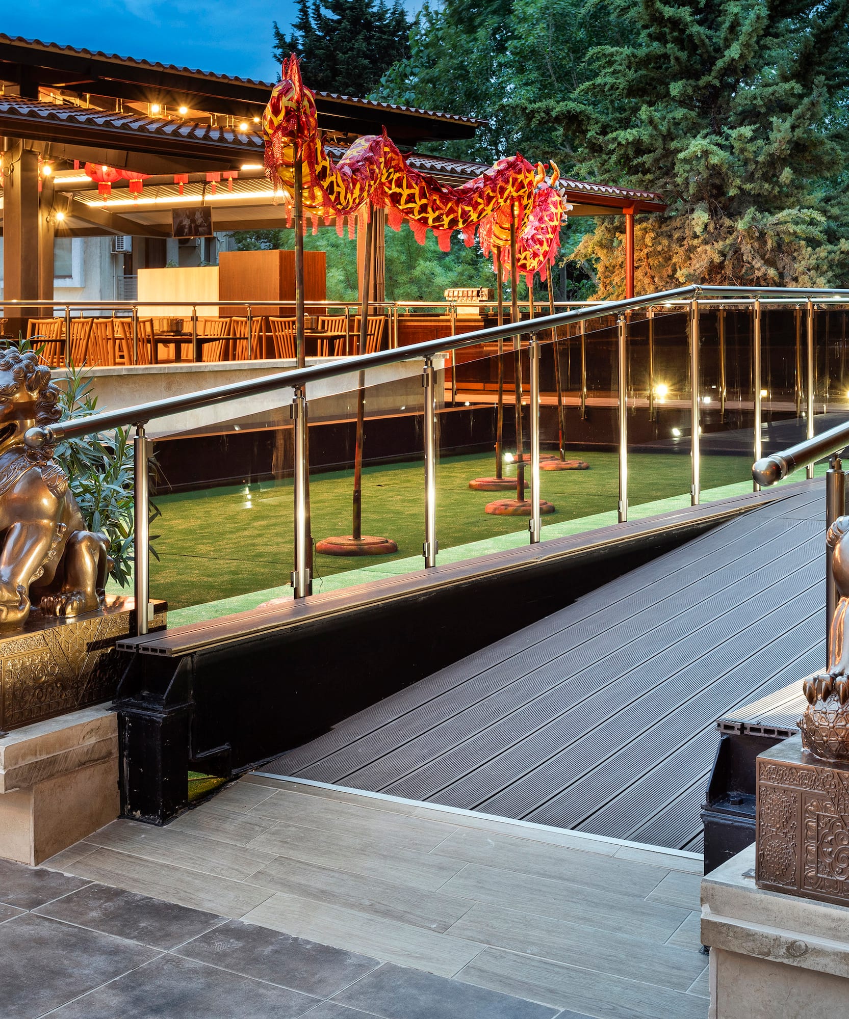 a building with a staircase and statues of lions