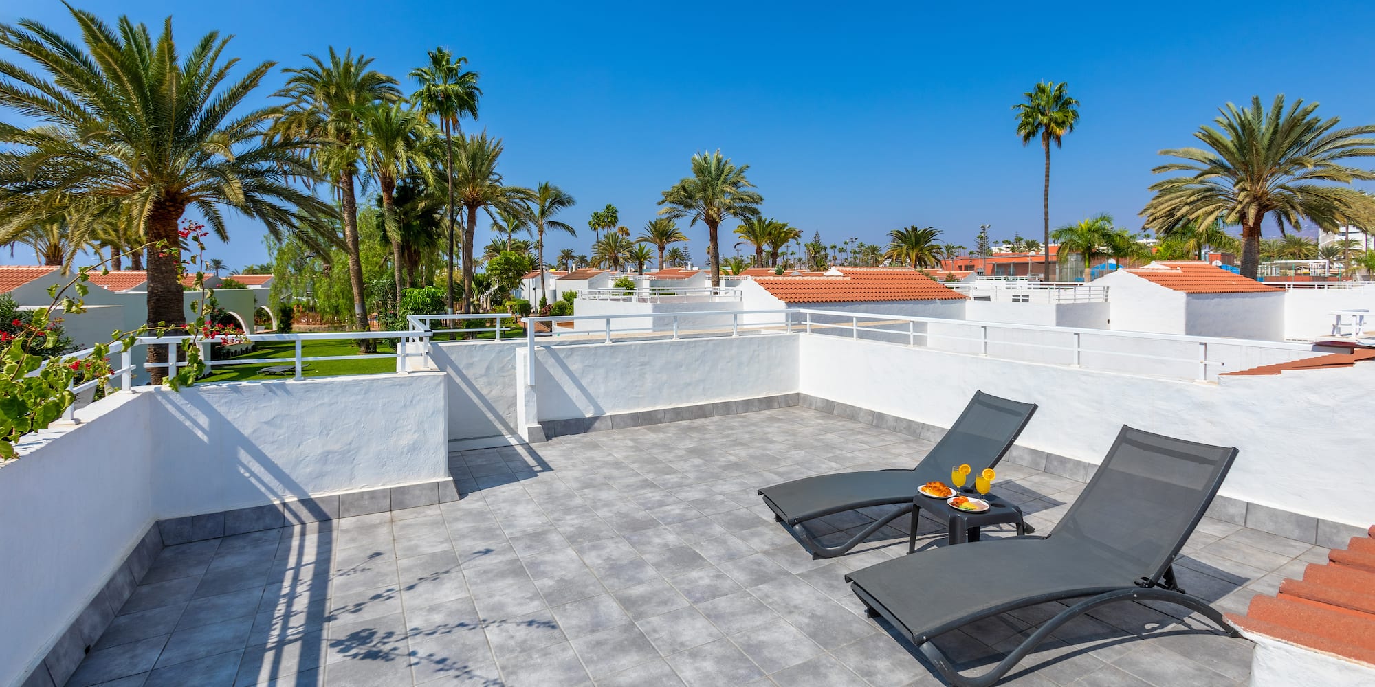 a deck chairs on a rooftop