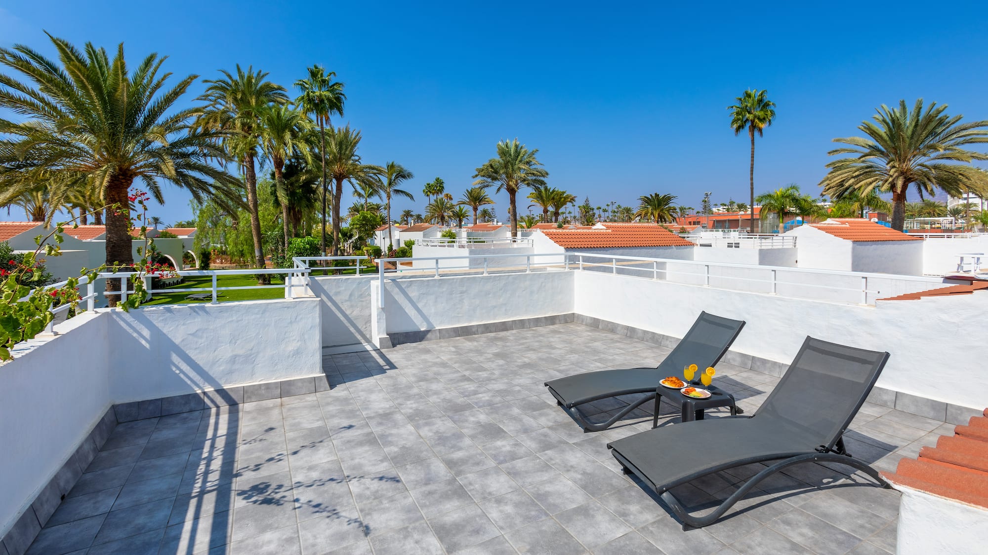 a deck chairs on a rooftop