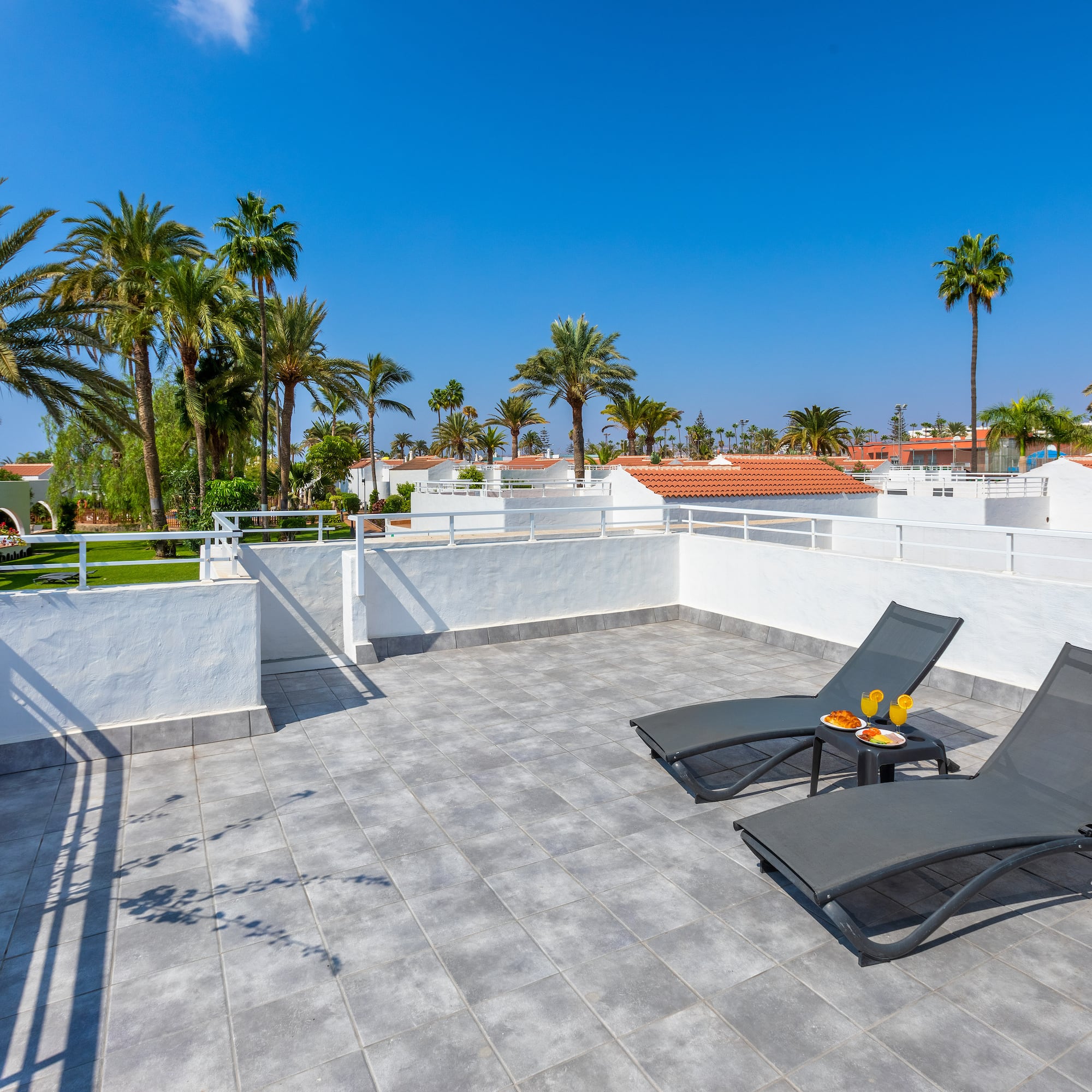 a deck chairs on a rooftop