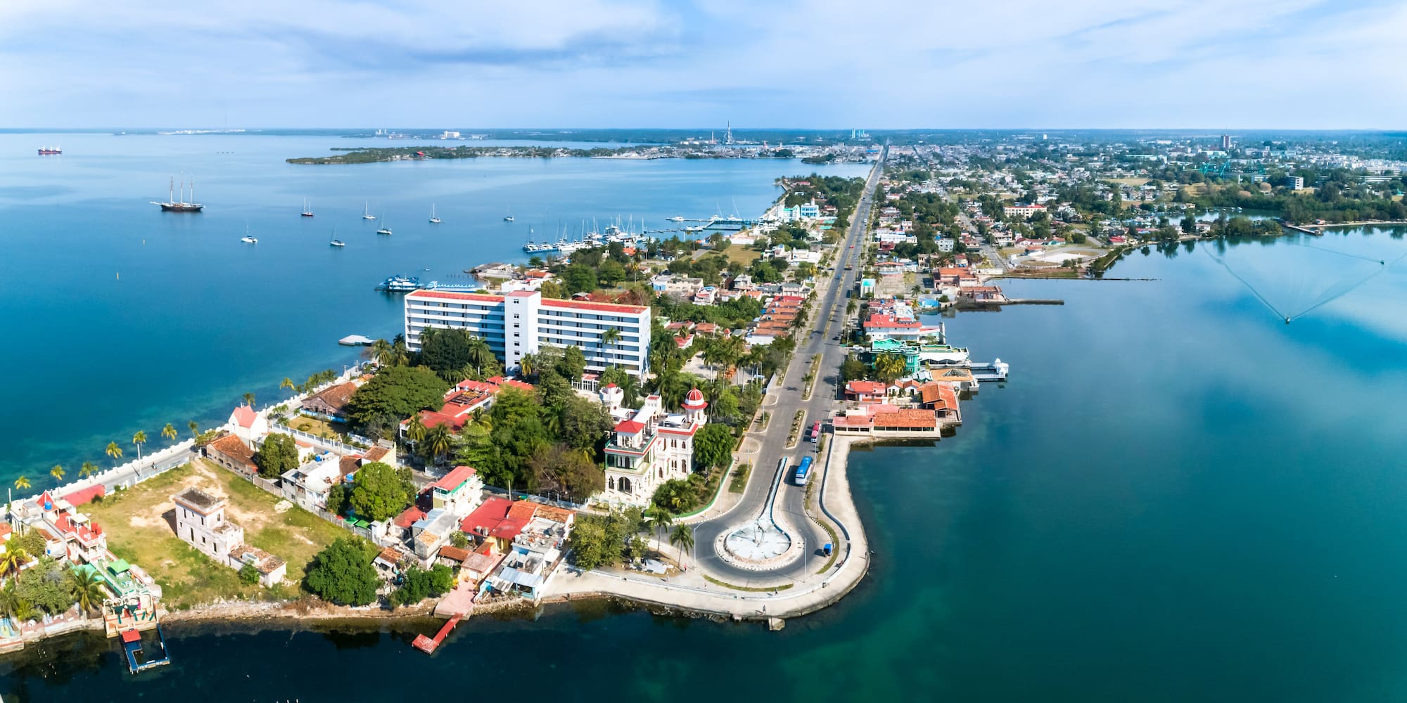 an aerial view of a city by water