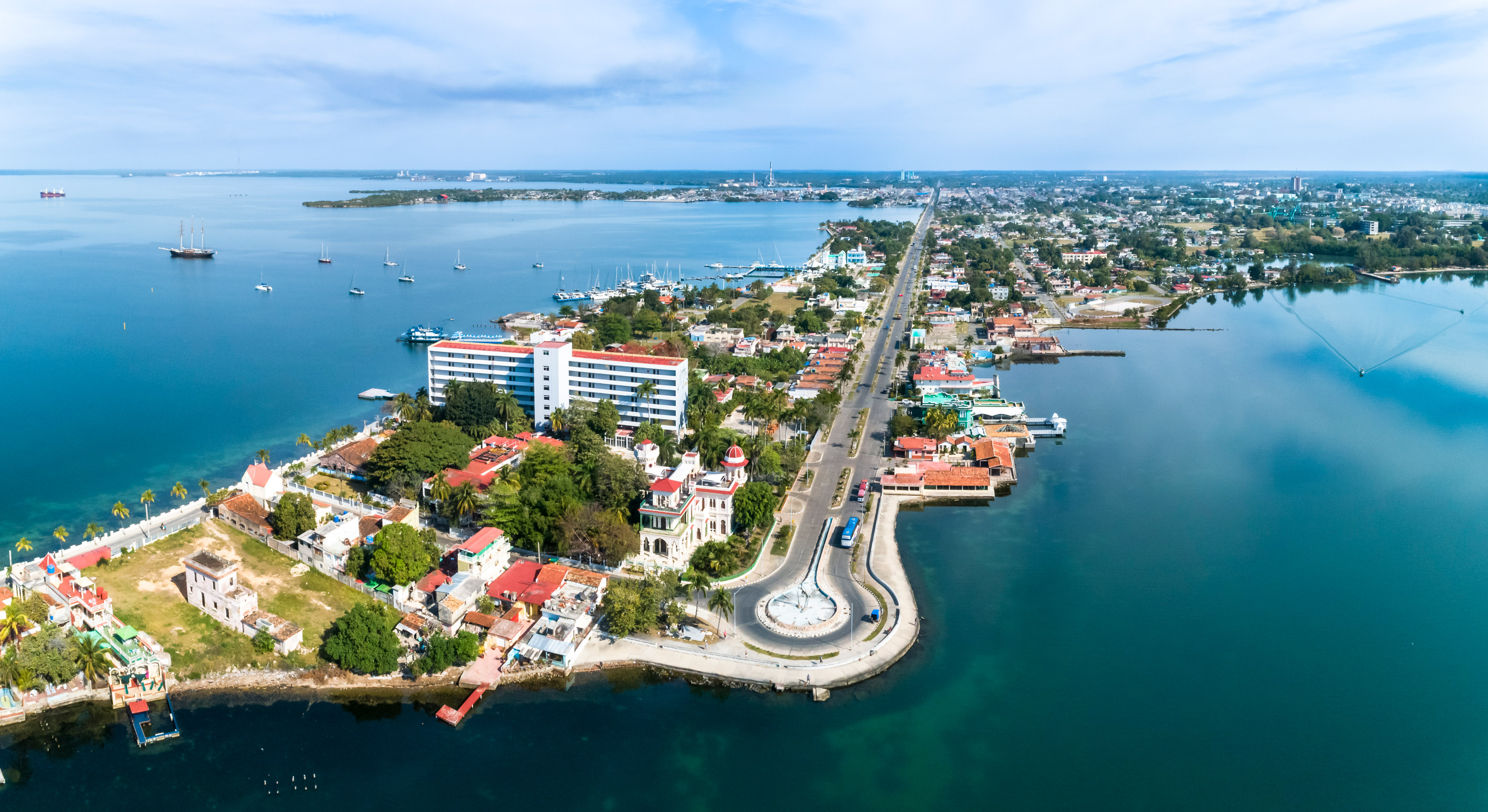 an aerial view of a city by water