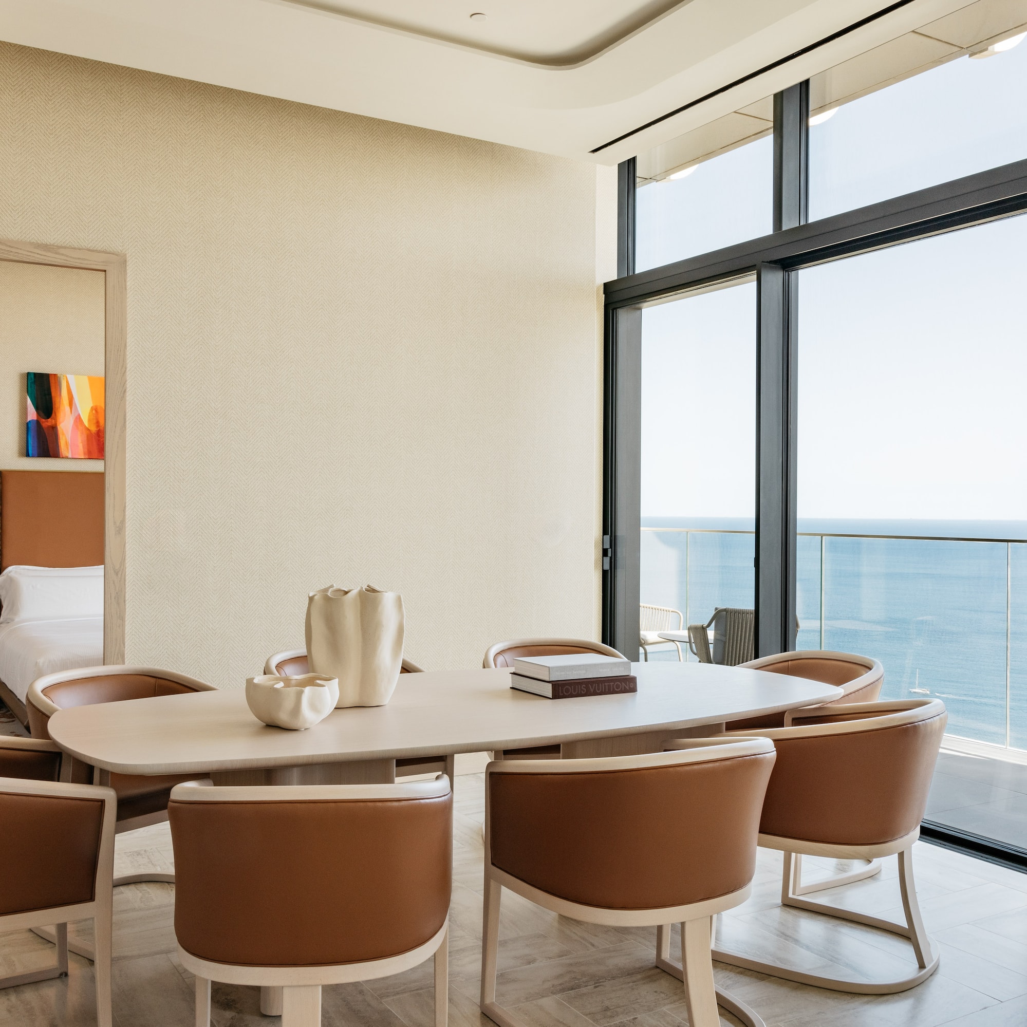 a room with a table and chairs