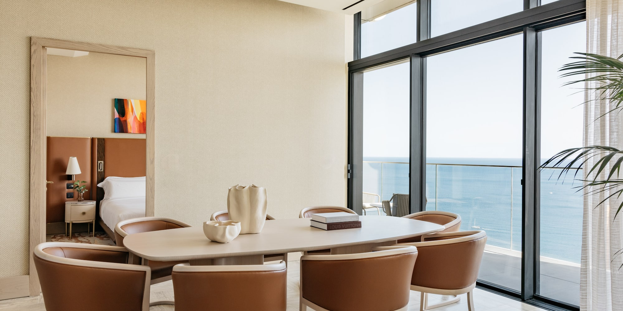 a room with a table and chairs