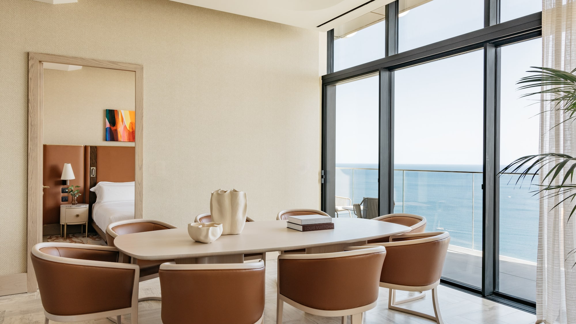 a room with a table and chairs